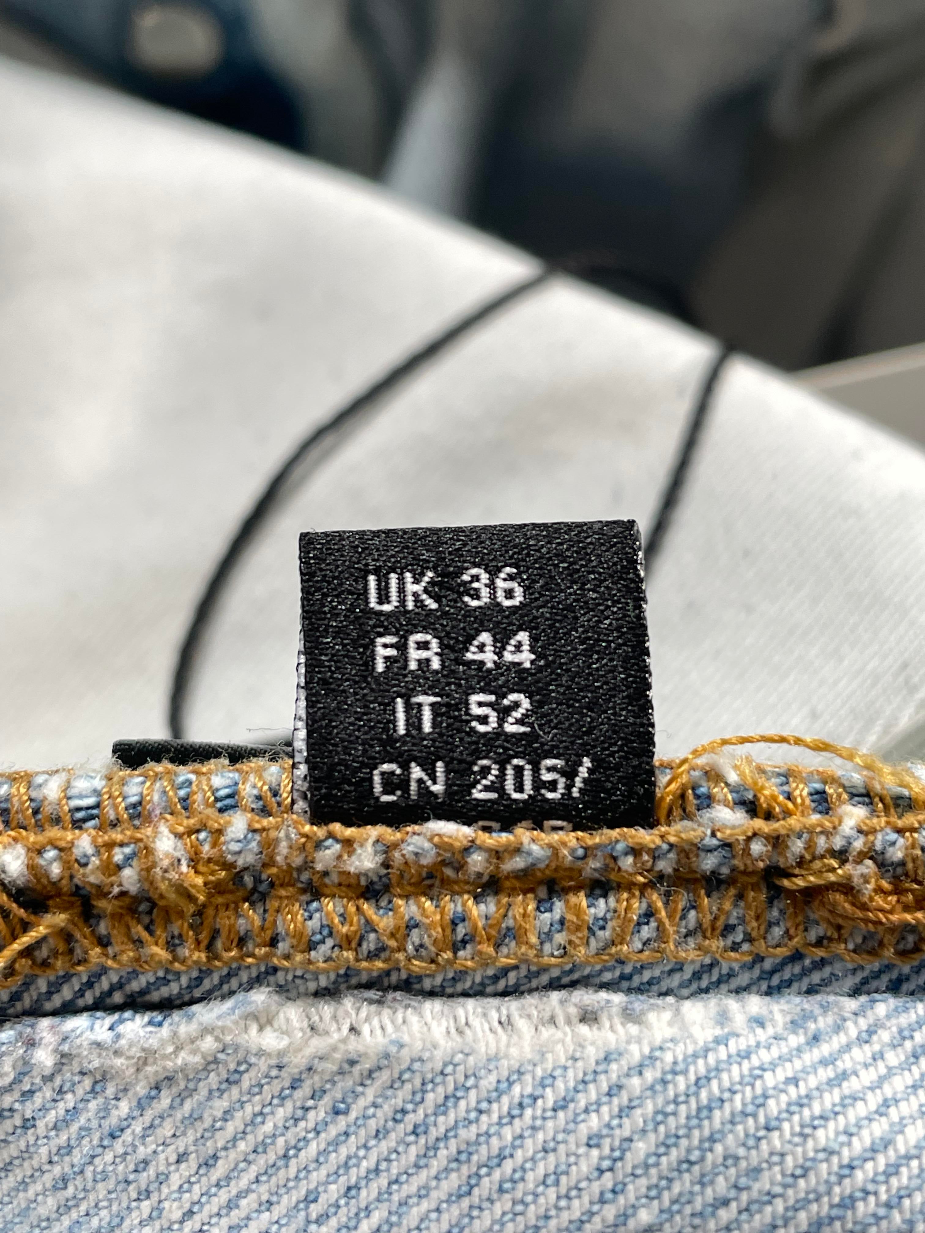 Amiri MX1 Camo Patch Light Wash Jeans