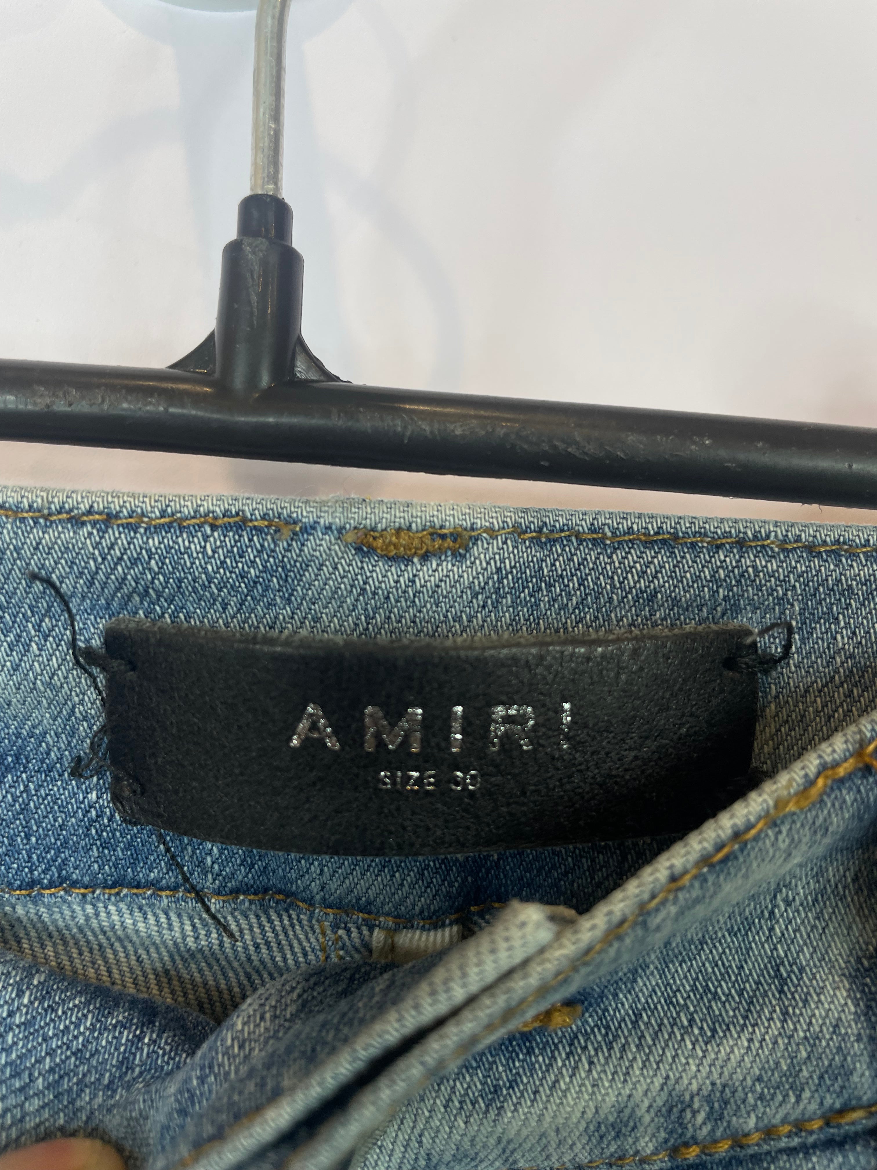 Amiri Light Wash Tie Dye Patch Blue Jeans