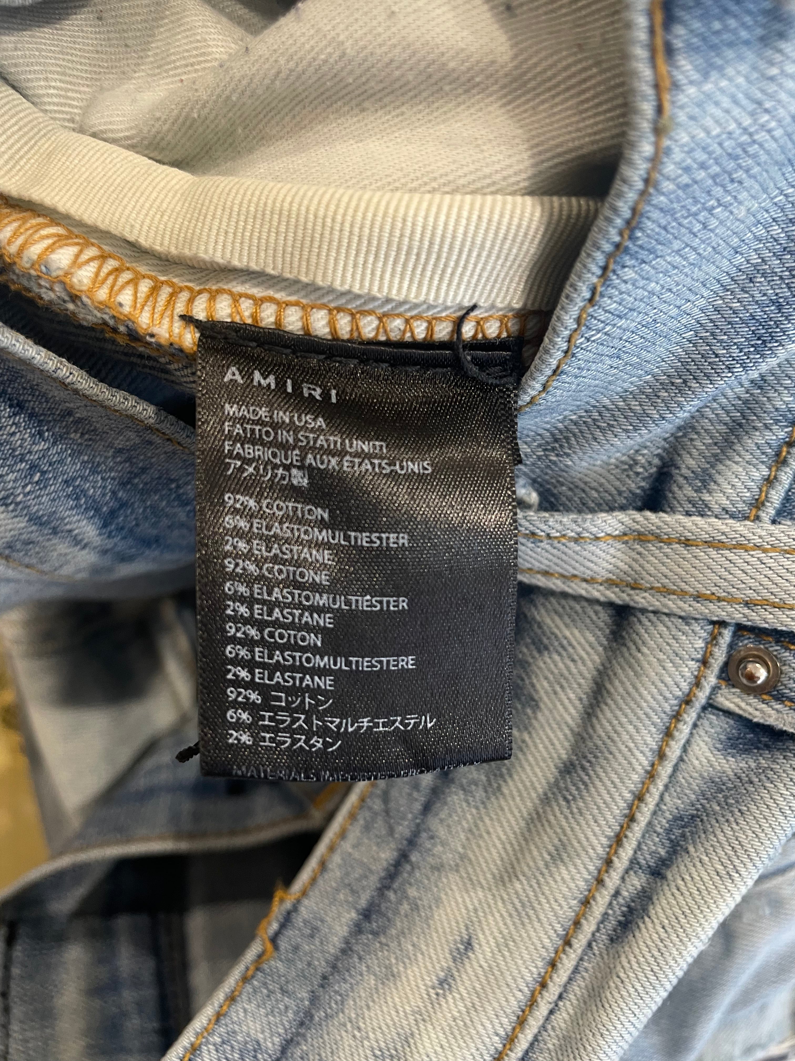 Amiri Light Wash Tie Dye Patch Blue Jeans