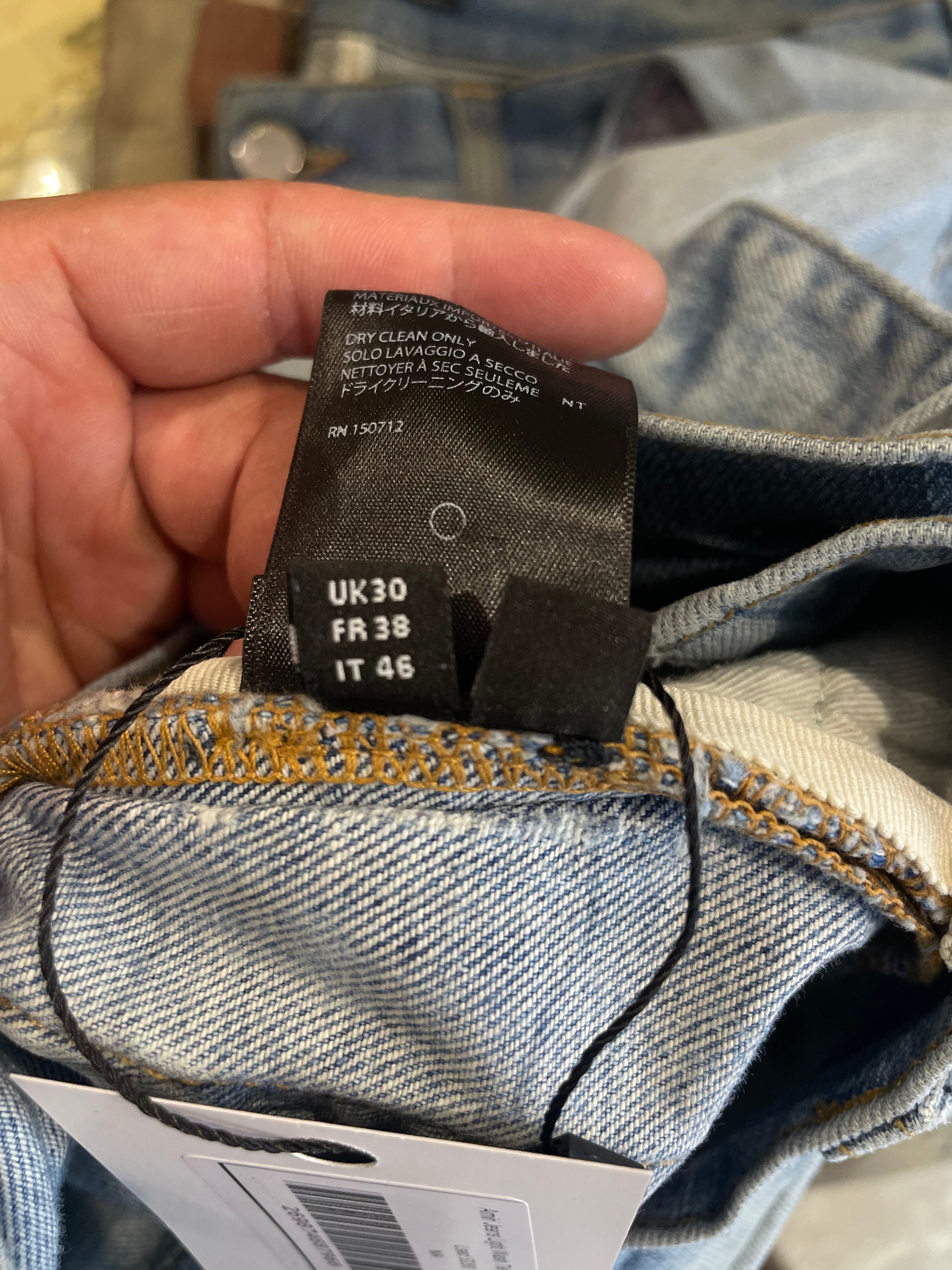 Amiri Light Wash Tie Dye Patch Blue Jeans