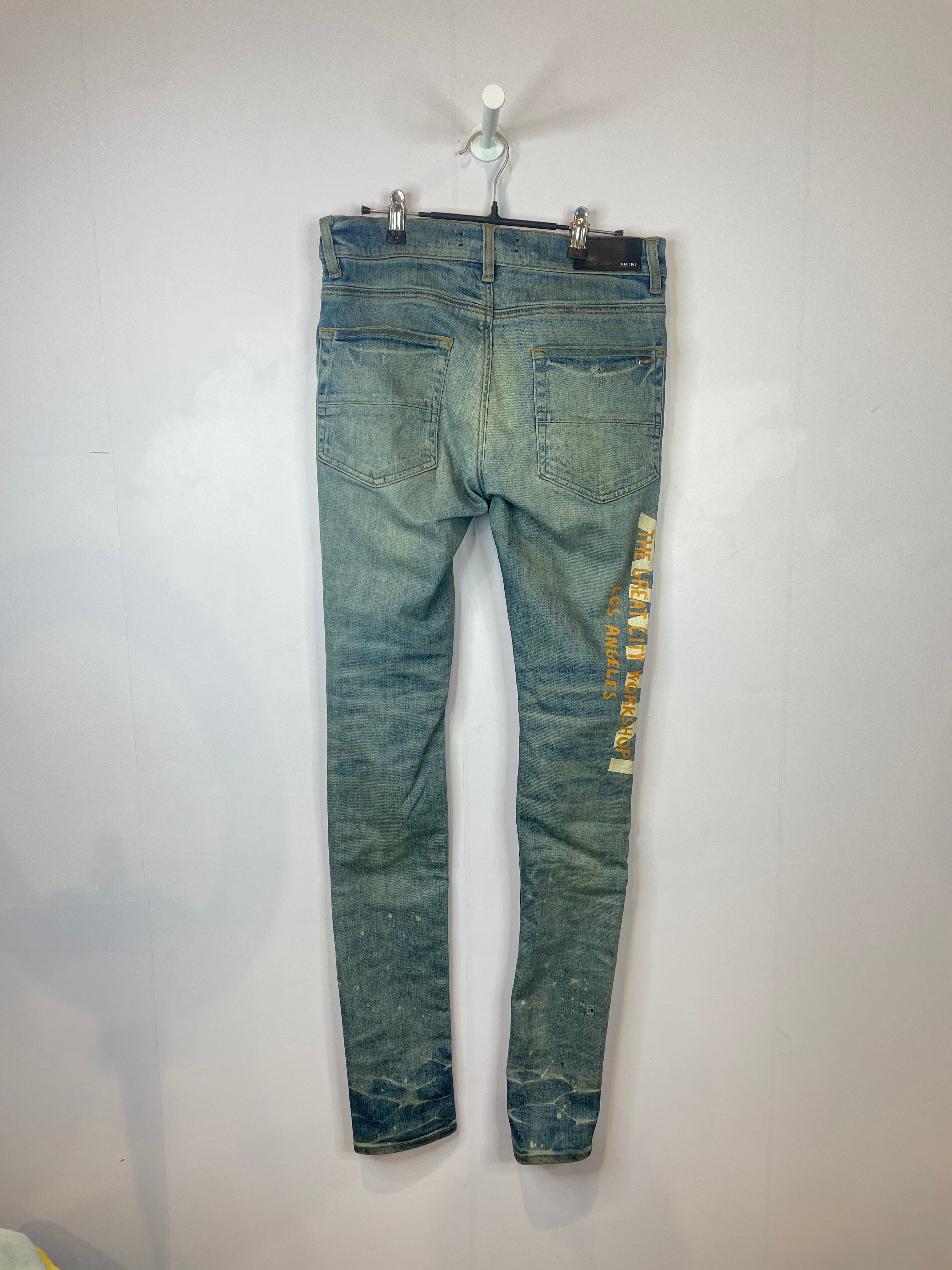 Amiri Orange Side Logo Light Wash Blue Jeans