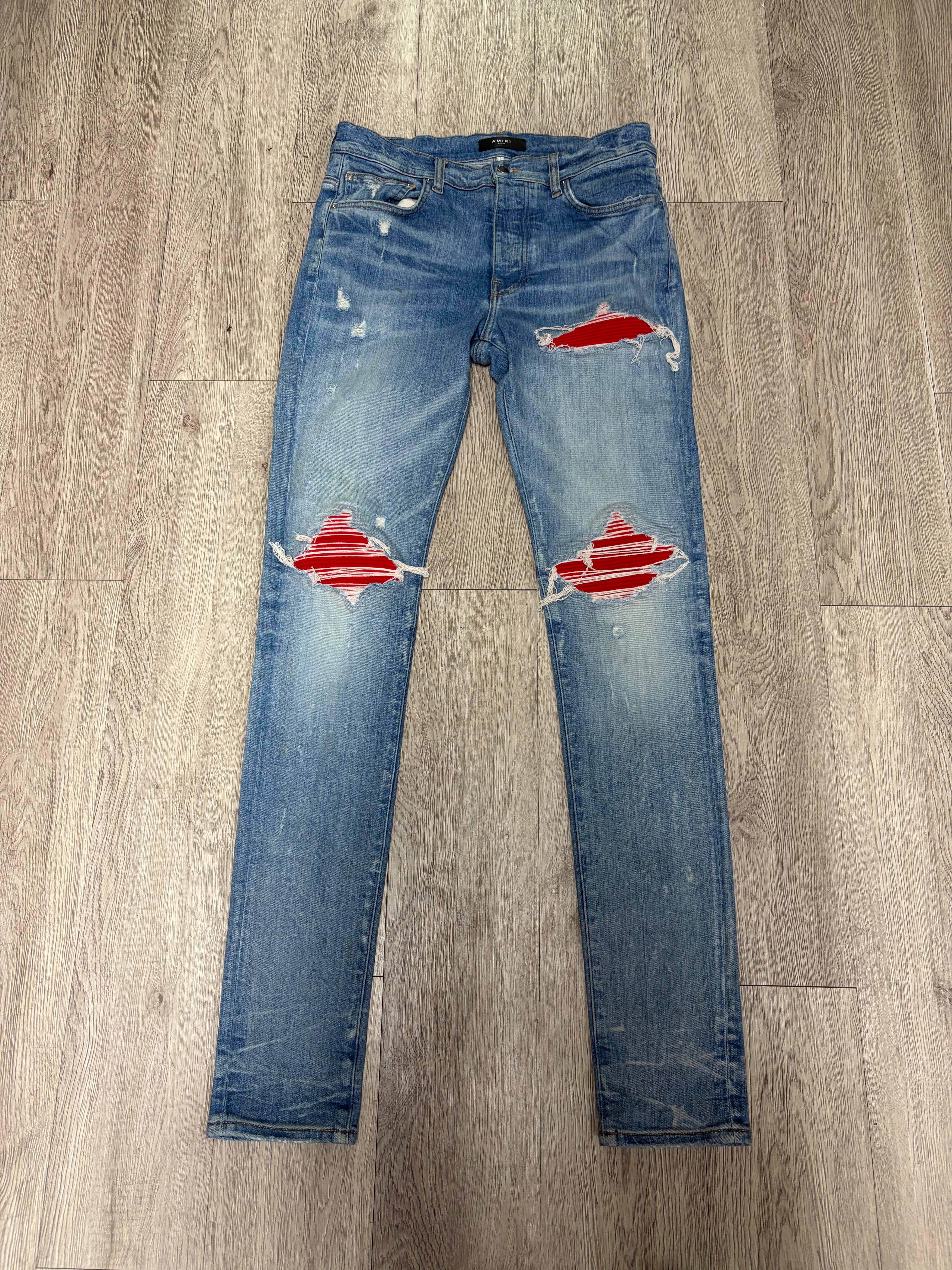 Amiri MX1 Light Wash Red Patch Jeans