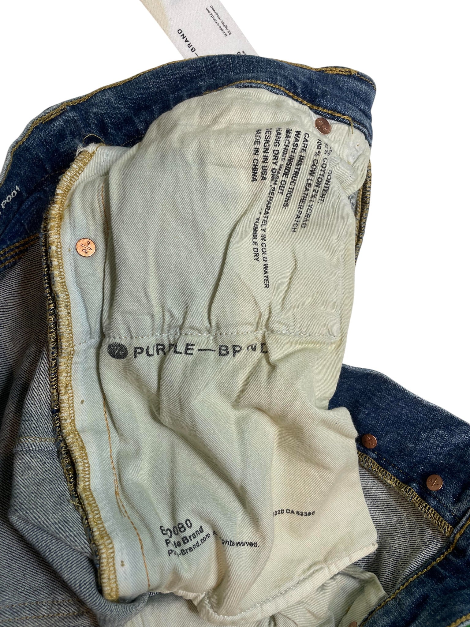 Purple Brand Light Wash Ripped Jeans