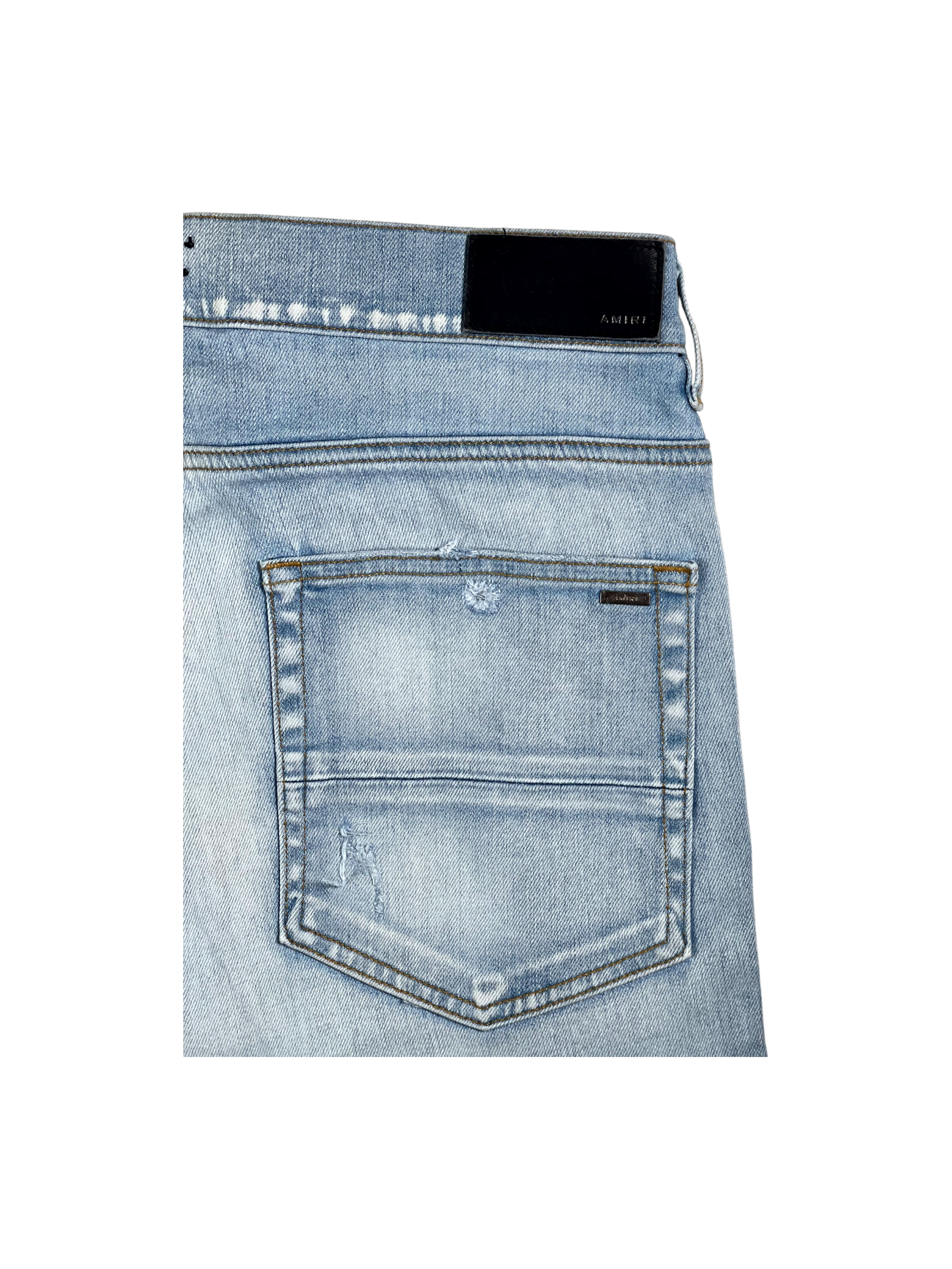 Amiri MX1 Camo Patch Light Wash Jeans