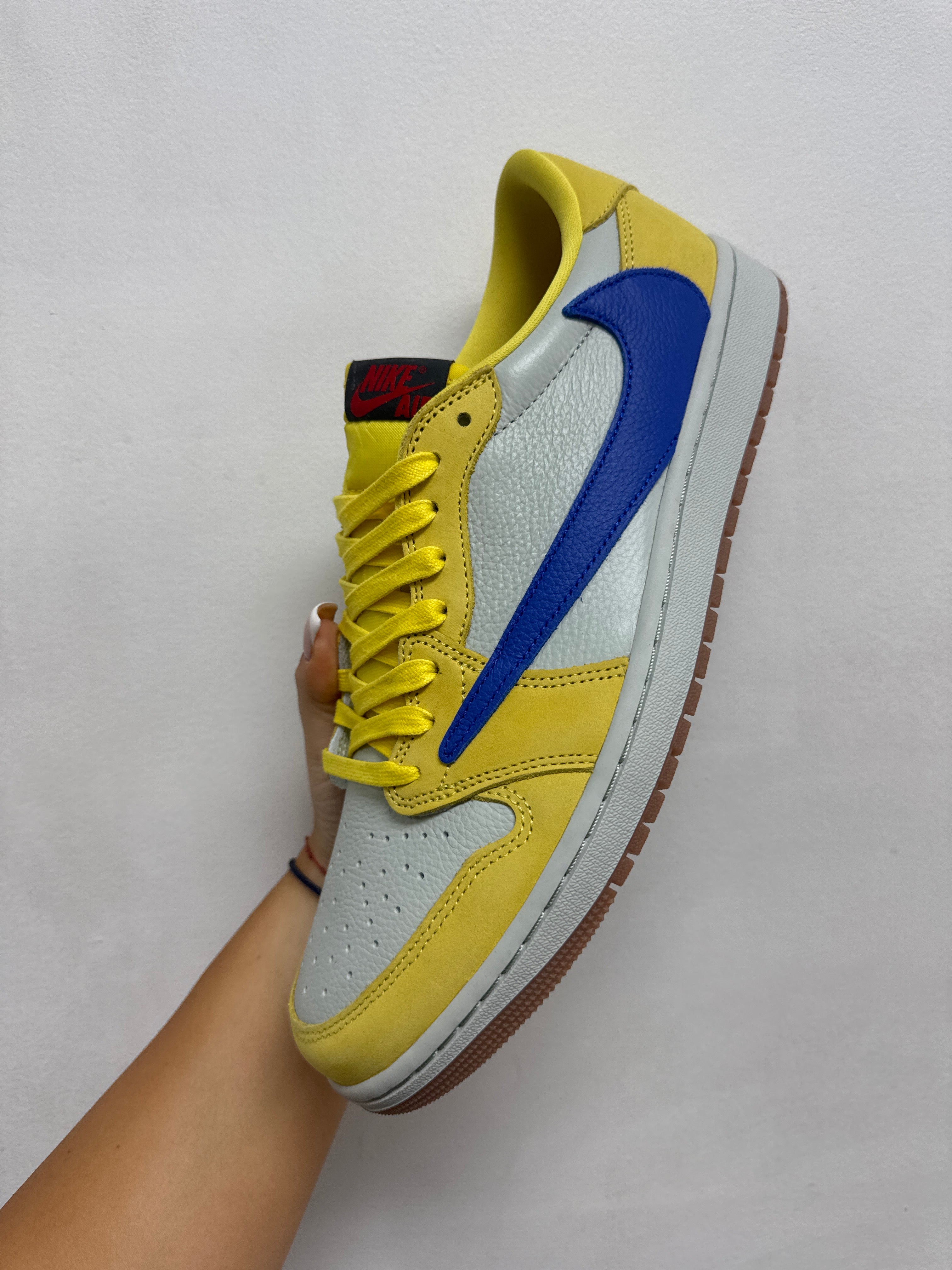 Jordan 1 Low Travis Scott Canary Sneakers
