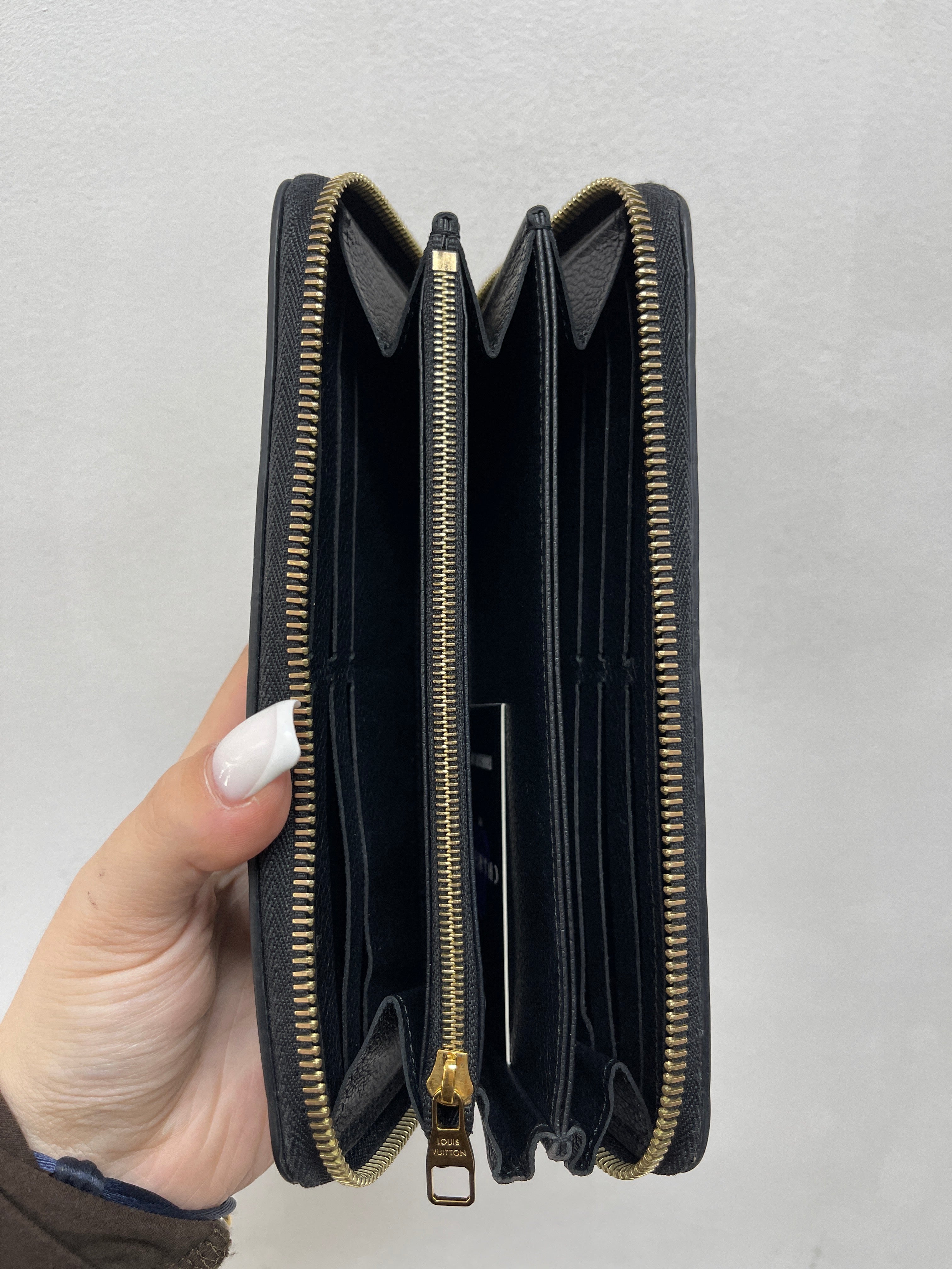 Louis Vuitton Embossed Monogram Zippy Wallet