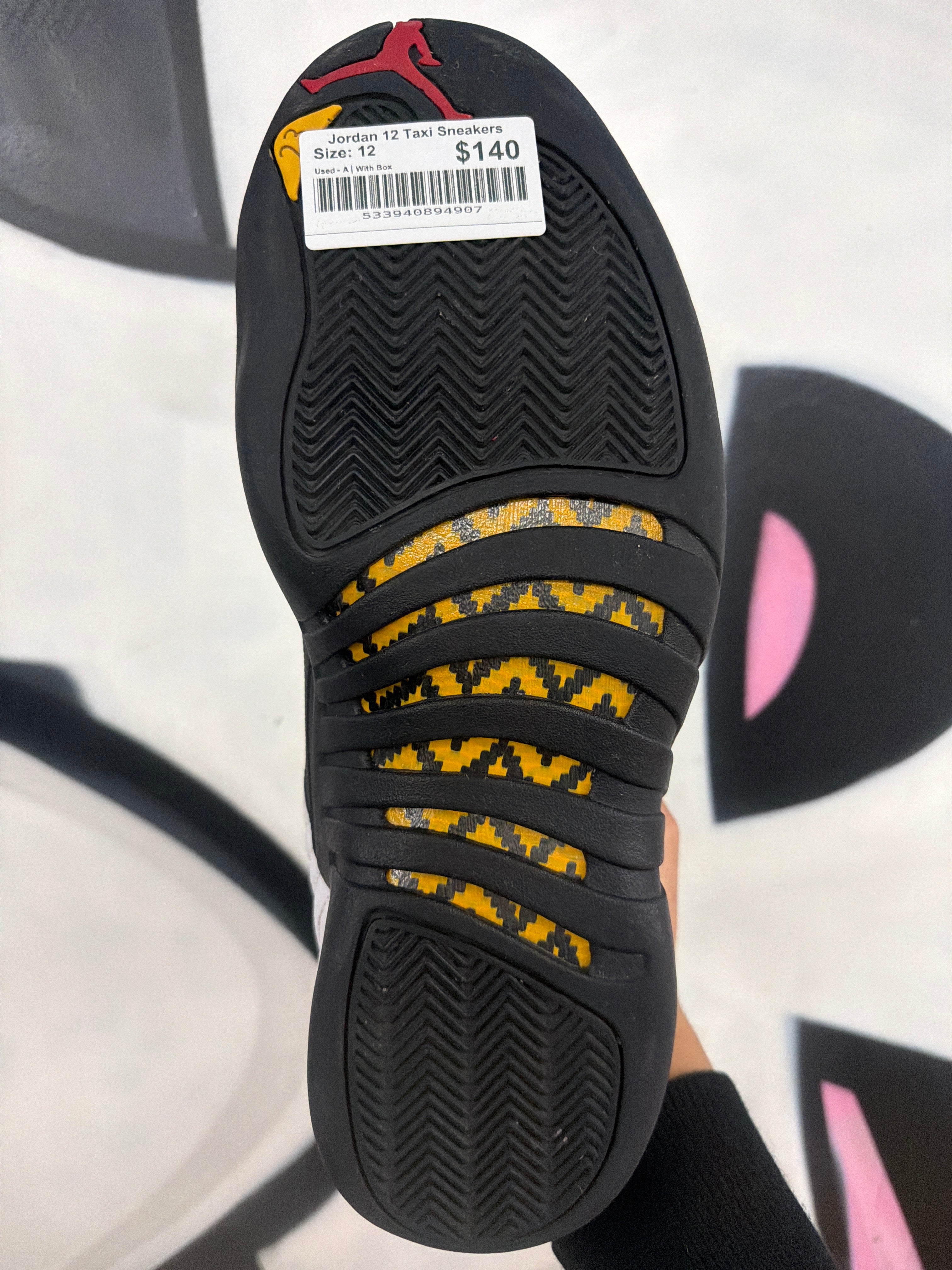 Jordan 12 Taxi Sneakers