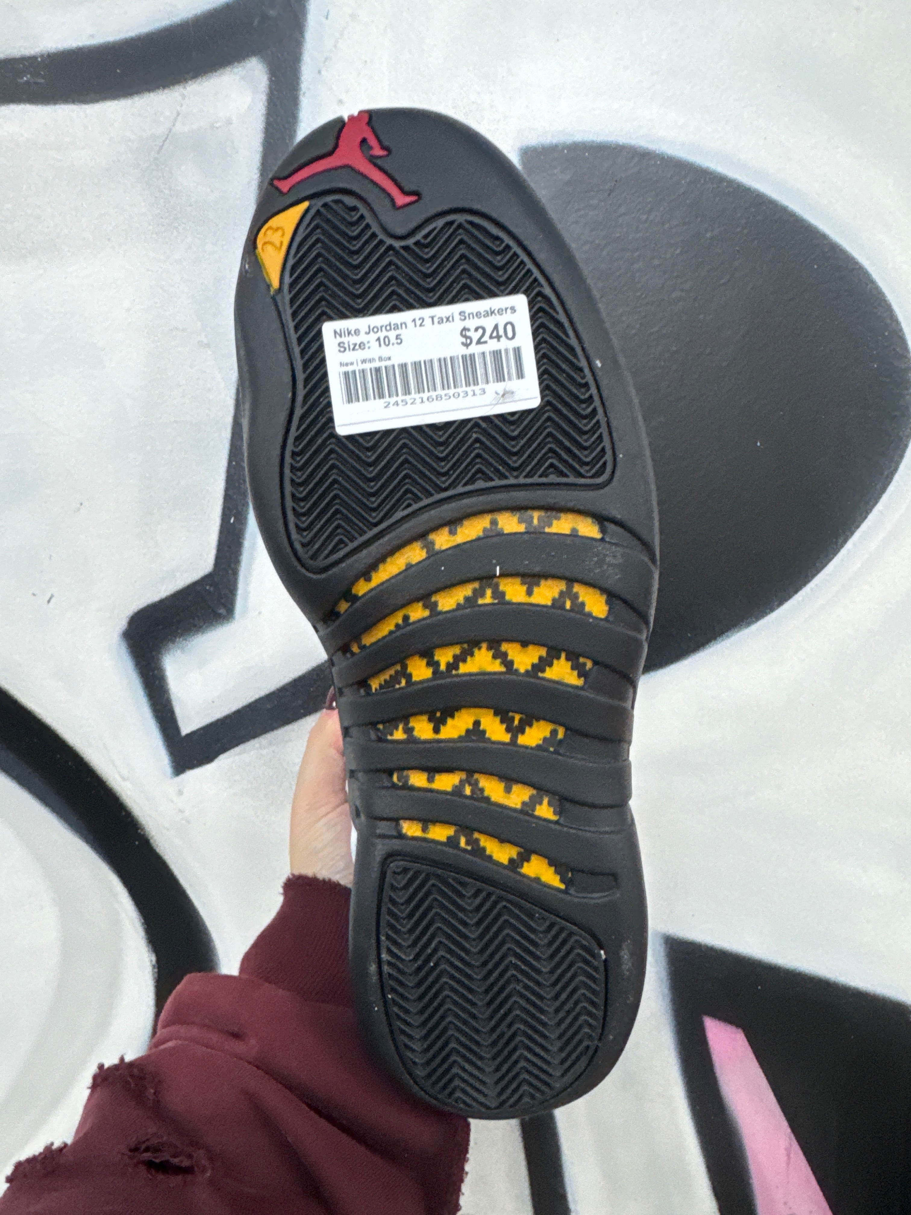 Nike Jordan 12 Taxi Sneakers