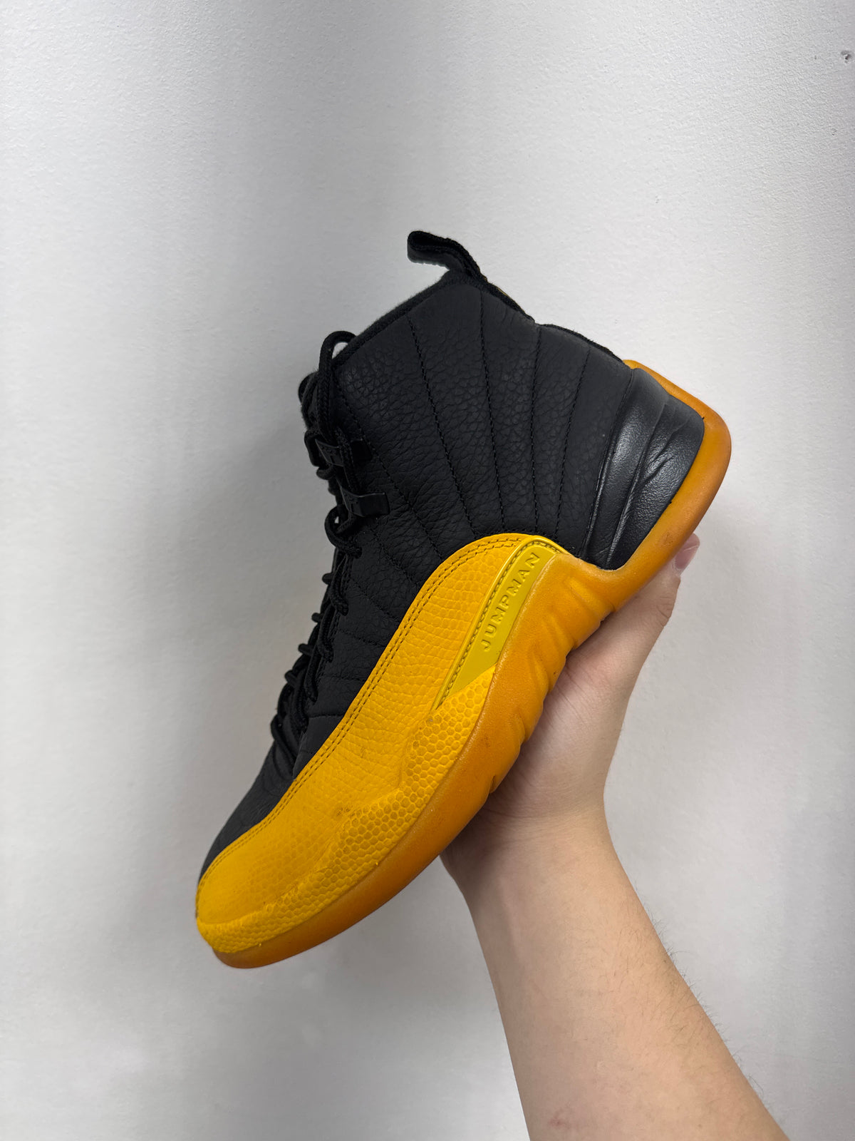 Jordan 12 University Gold Sneakers