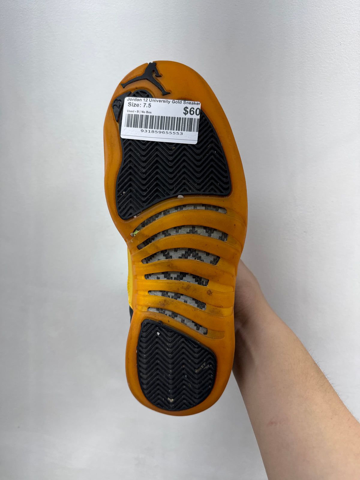 Jordan 12 University Gold Sneakers