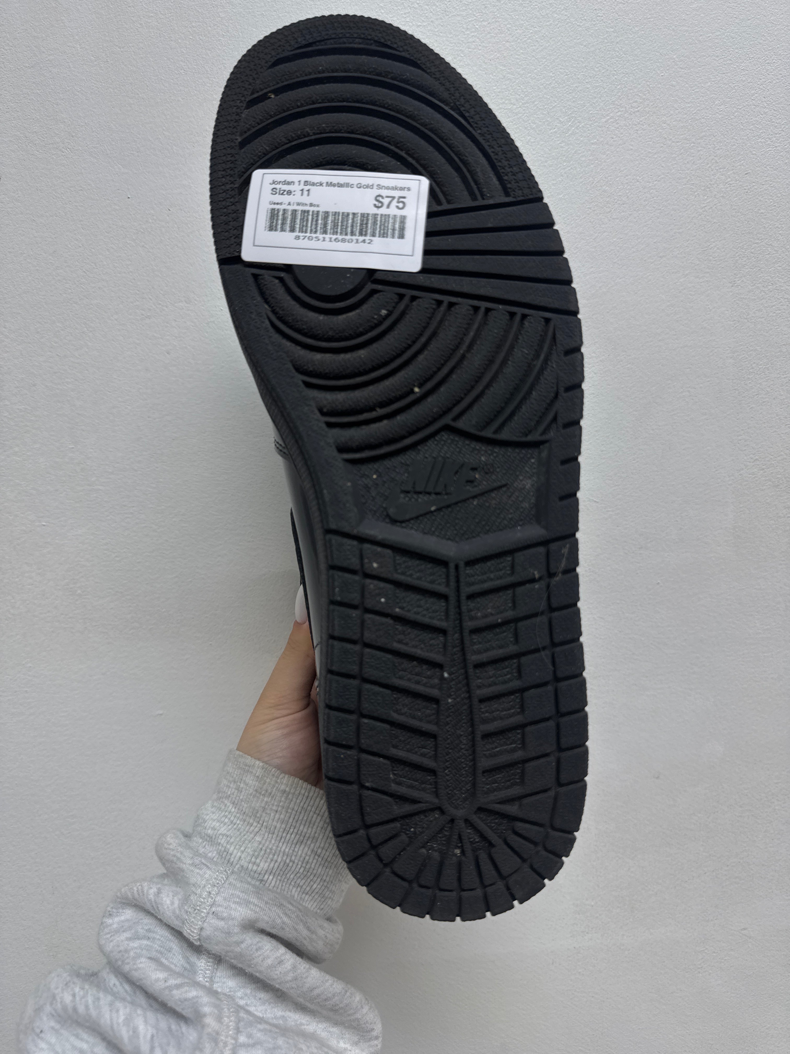 Jordan 1 Black Metallic Gold Sneakers
