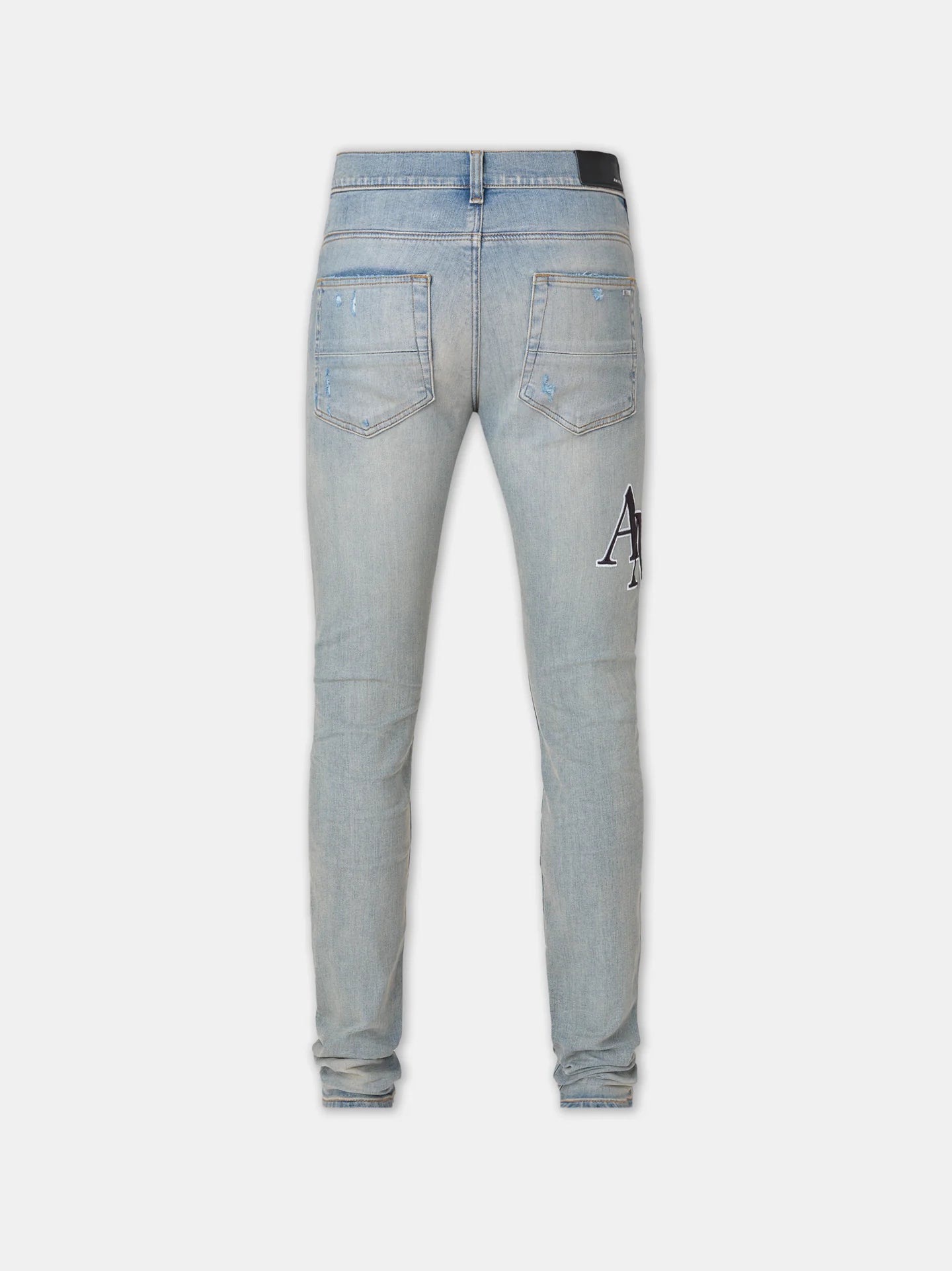 Amiri 'Staggered Logo' Indigo Jeans