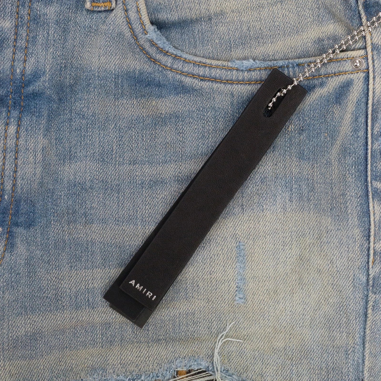 Amiri 'Thrasher Lunar New Year' Light Wash Indigo Jeans