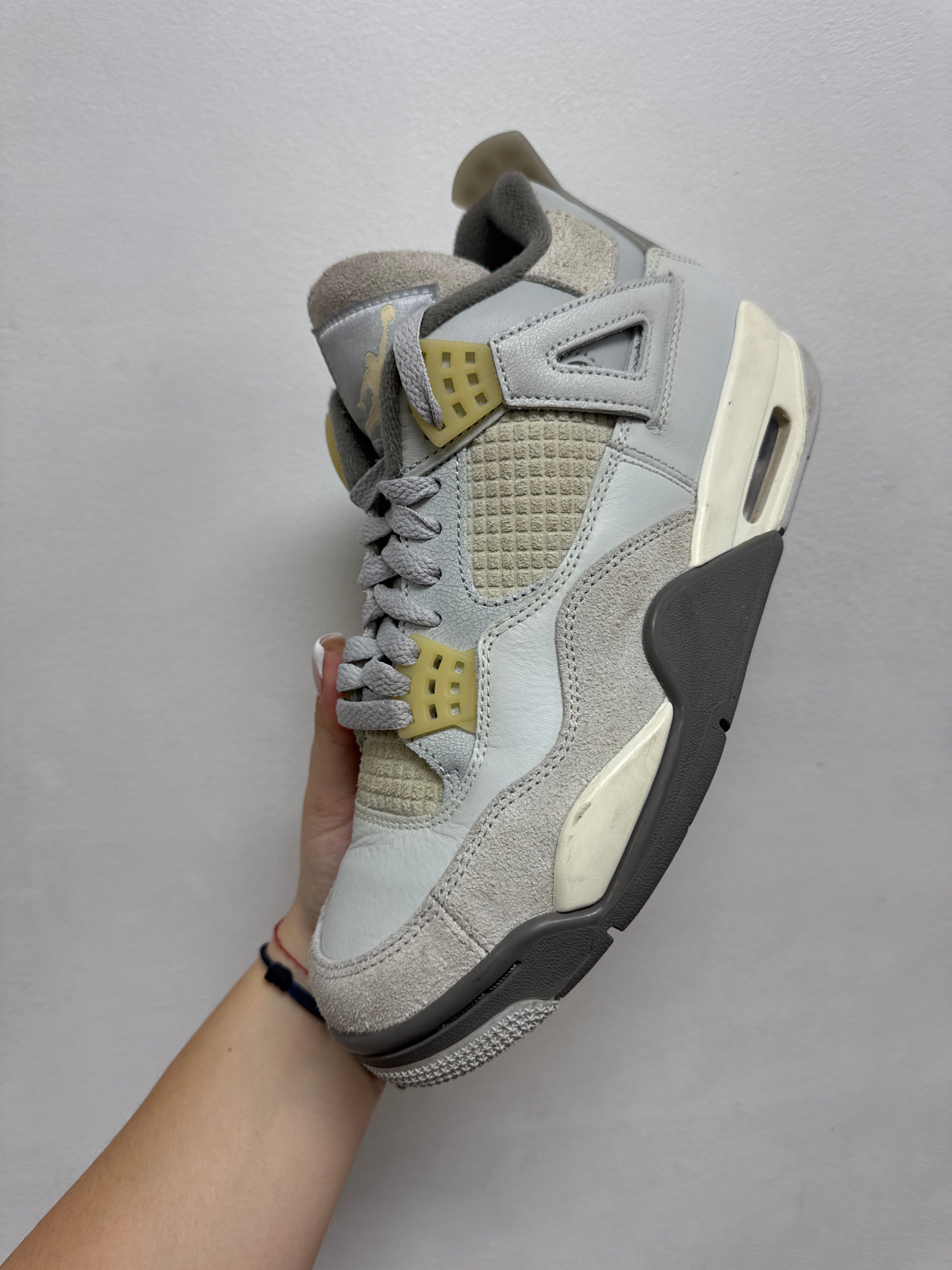 Jordan 4 Craft Photon Dust Sneakers