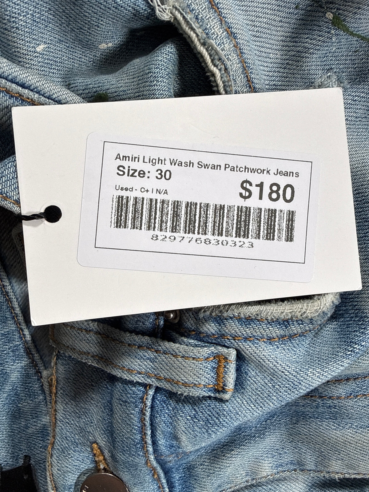 Amiri Light Wash Swan Patchwork Jeans
