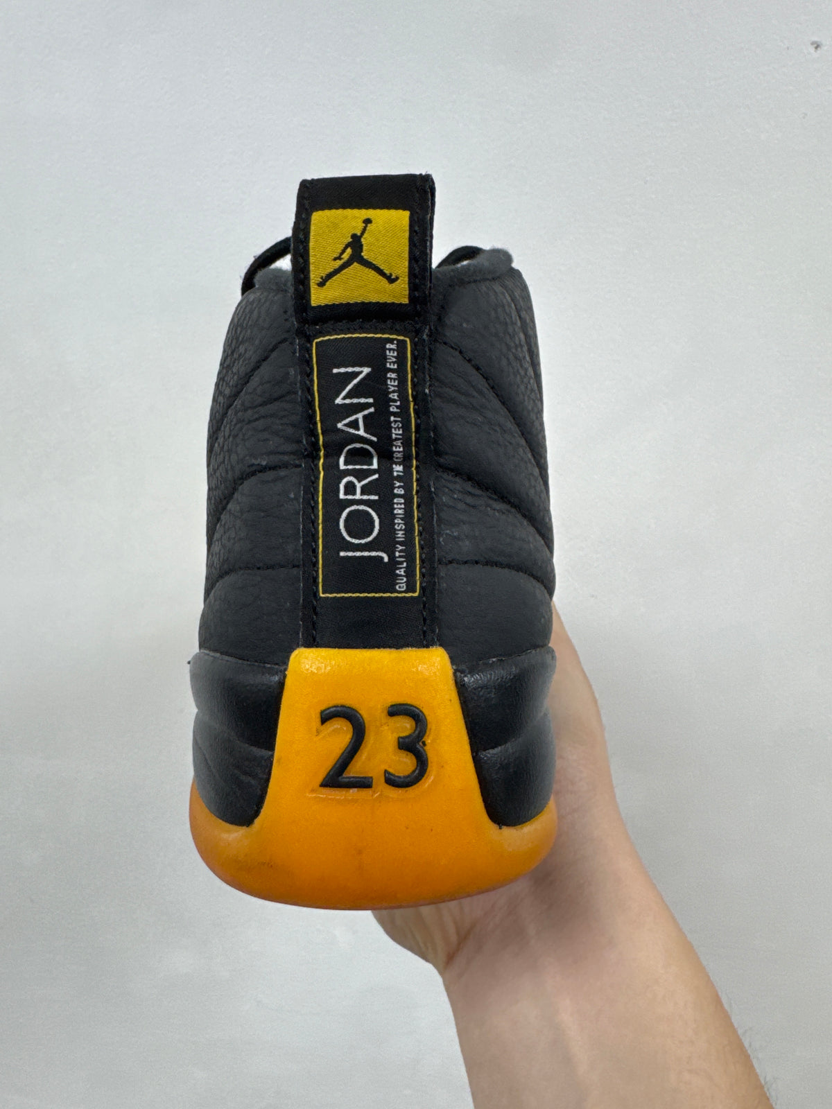 Jordan 12 University Gold Sneakers