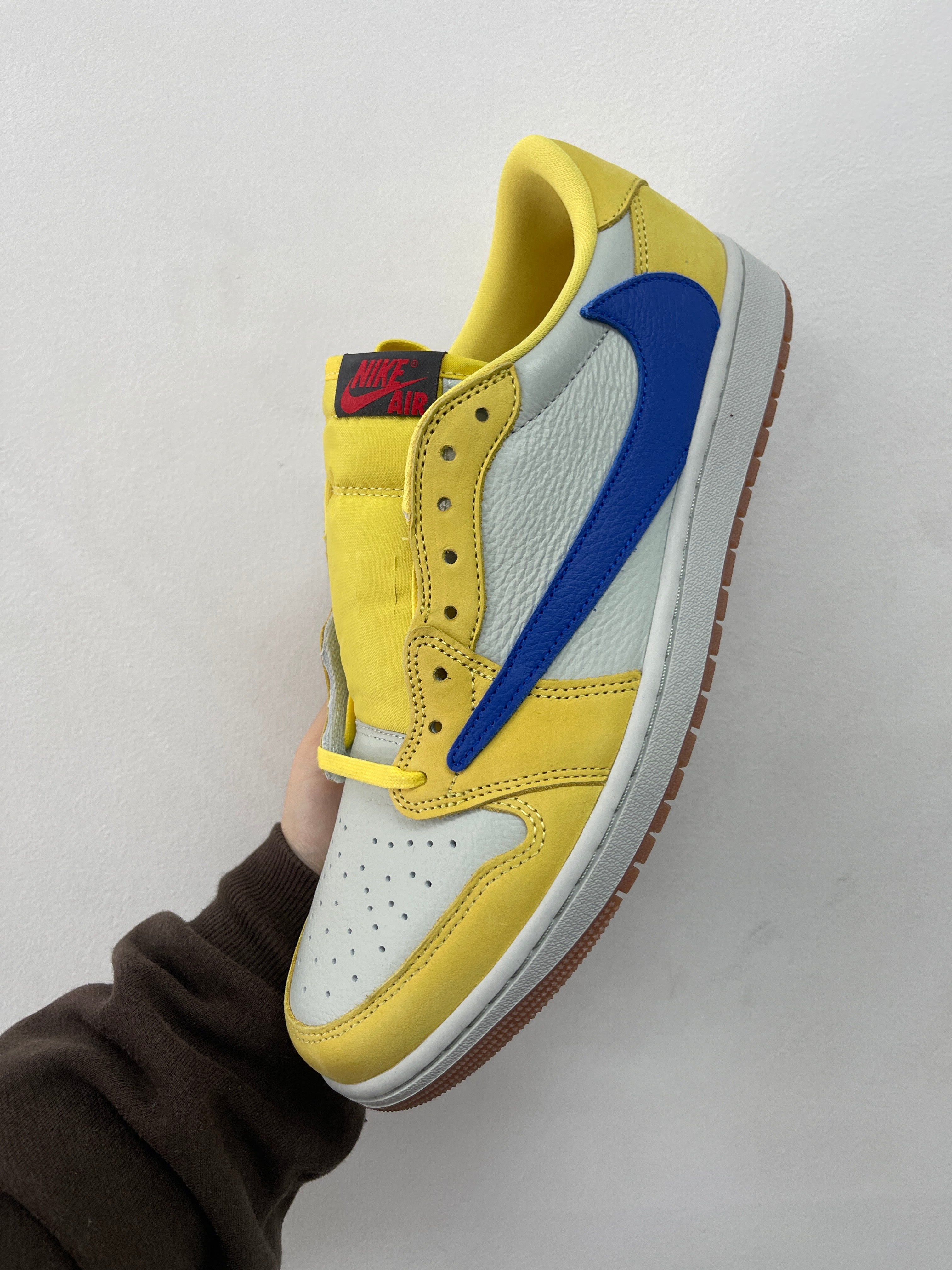 Jordan 1 Low Travis Scott Canary Sneakers