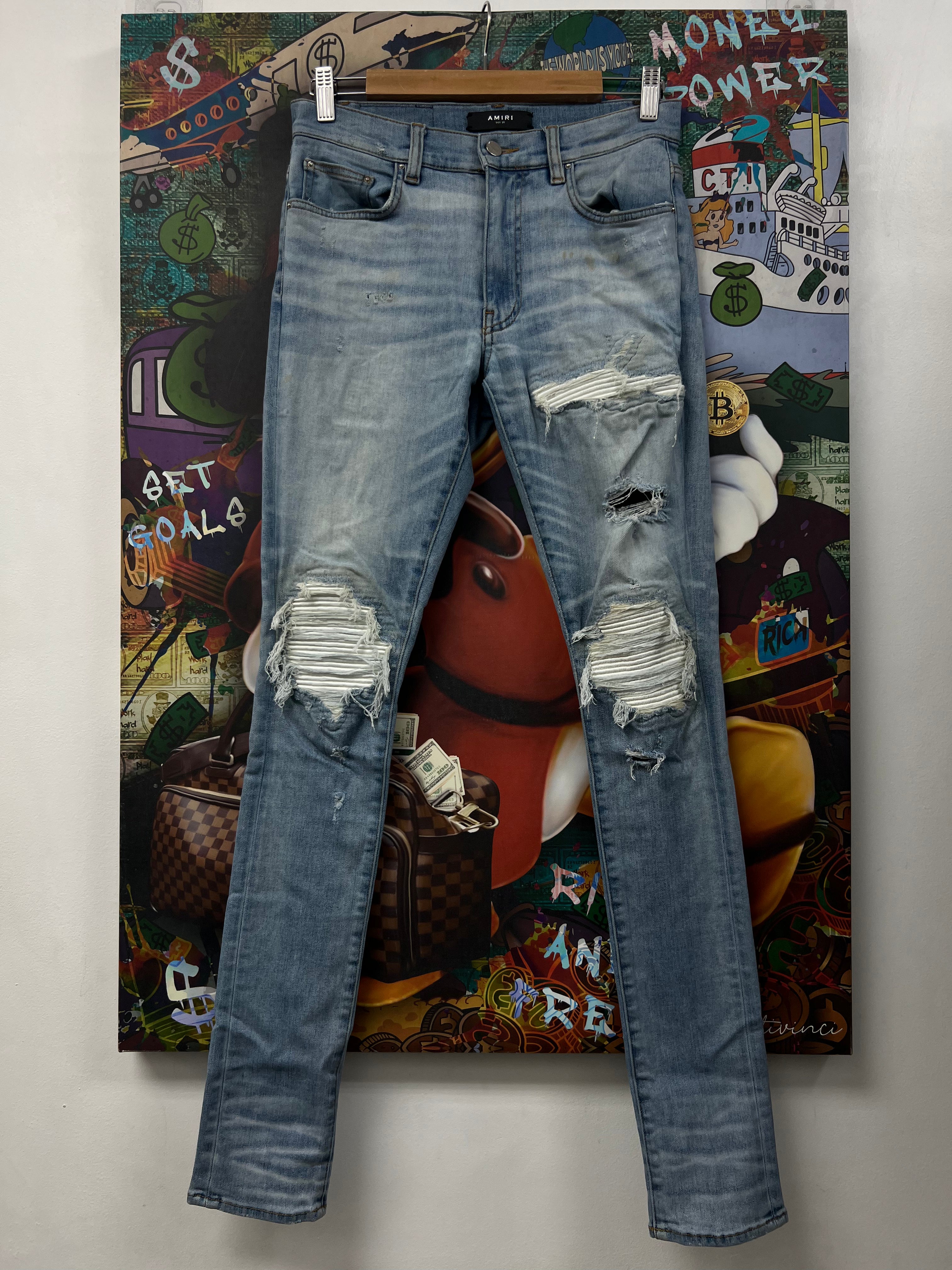 Amiri Mx1 Light Wash White Patch Jeans