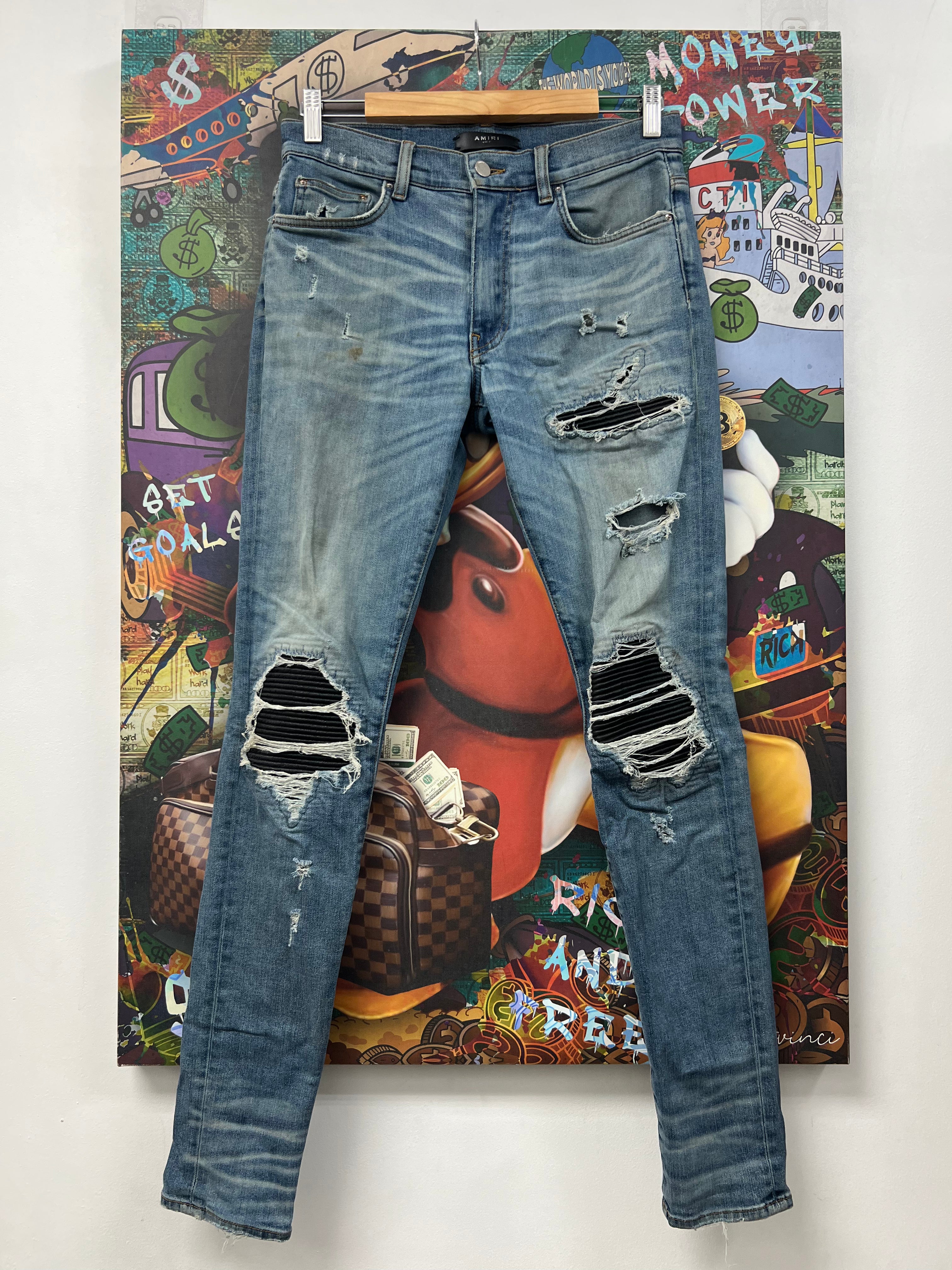 Amiri MX1 Light Wash Black Leather Patch Jeans