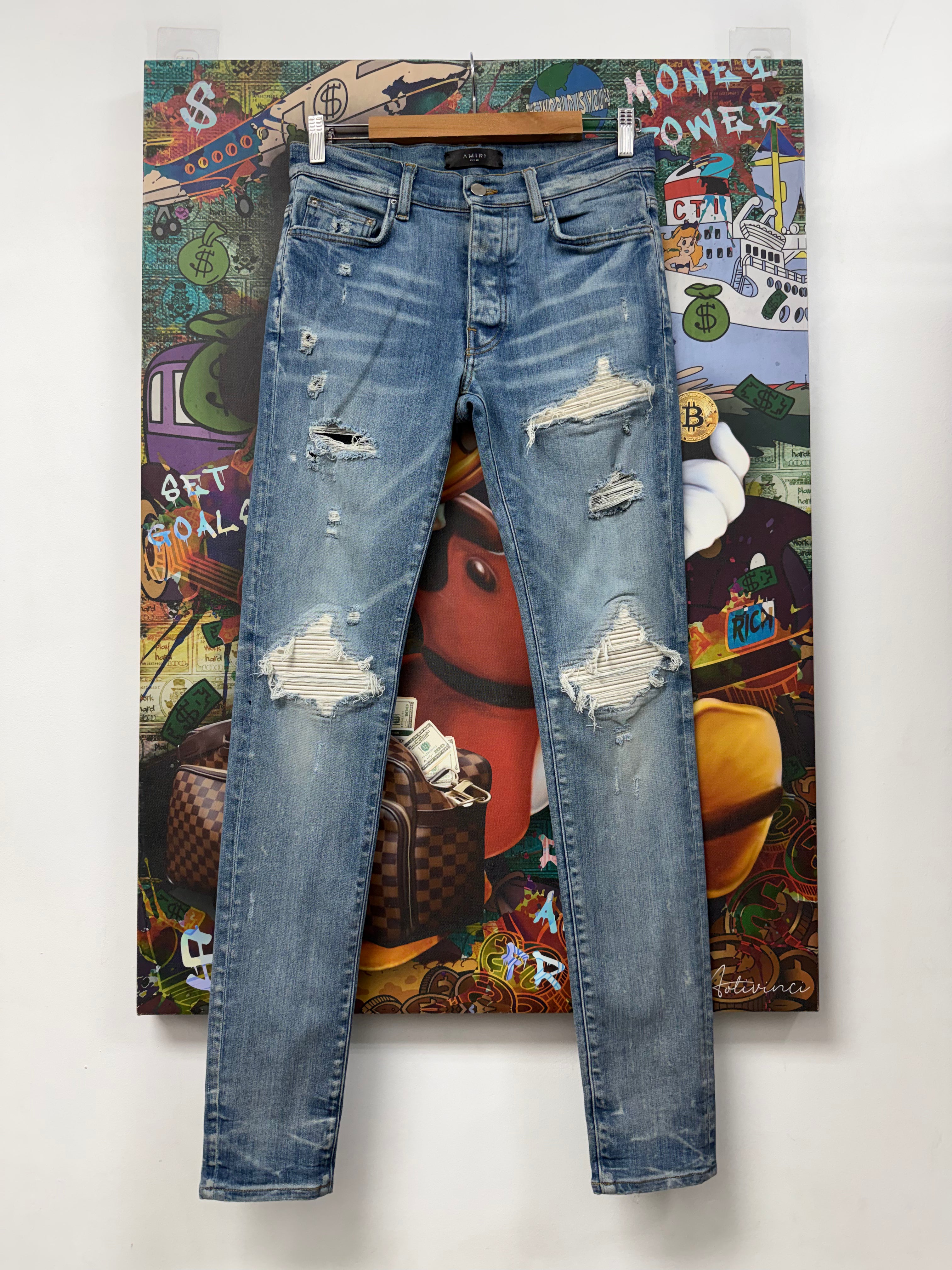 Amiri MX1 Light Wash White Patch Jeans