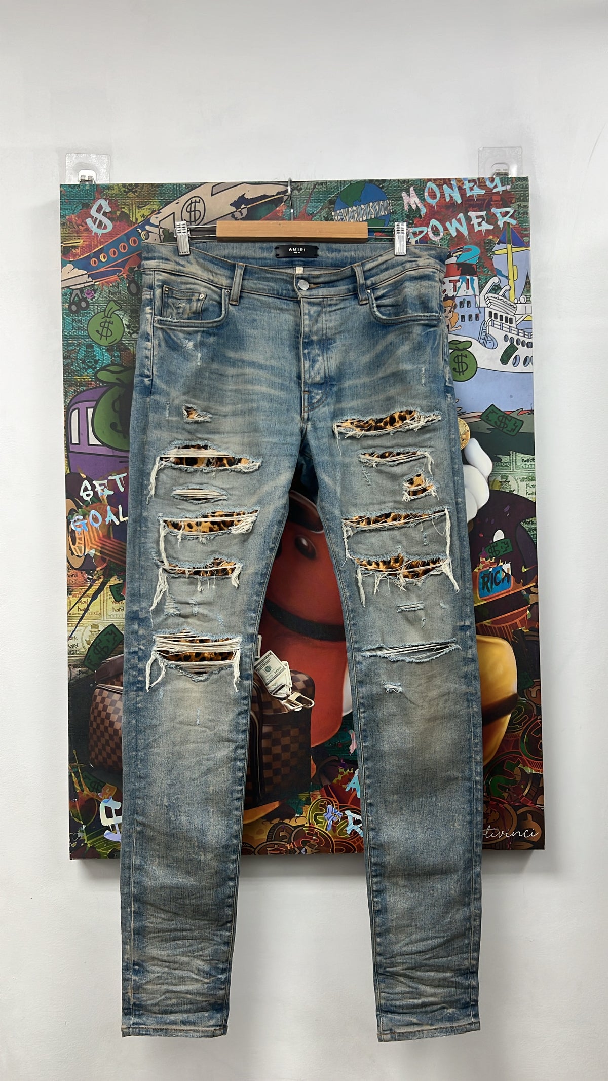 Amiri Light Wash Cheetah Thrasher Jeans