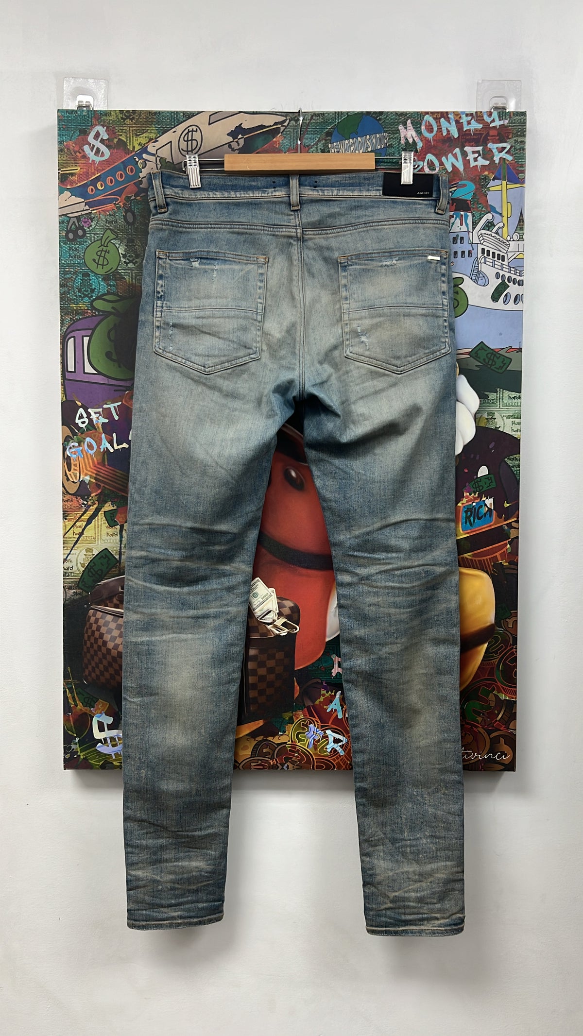 Amiri Light Wash Cheetah Thrasher Jeans
