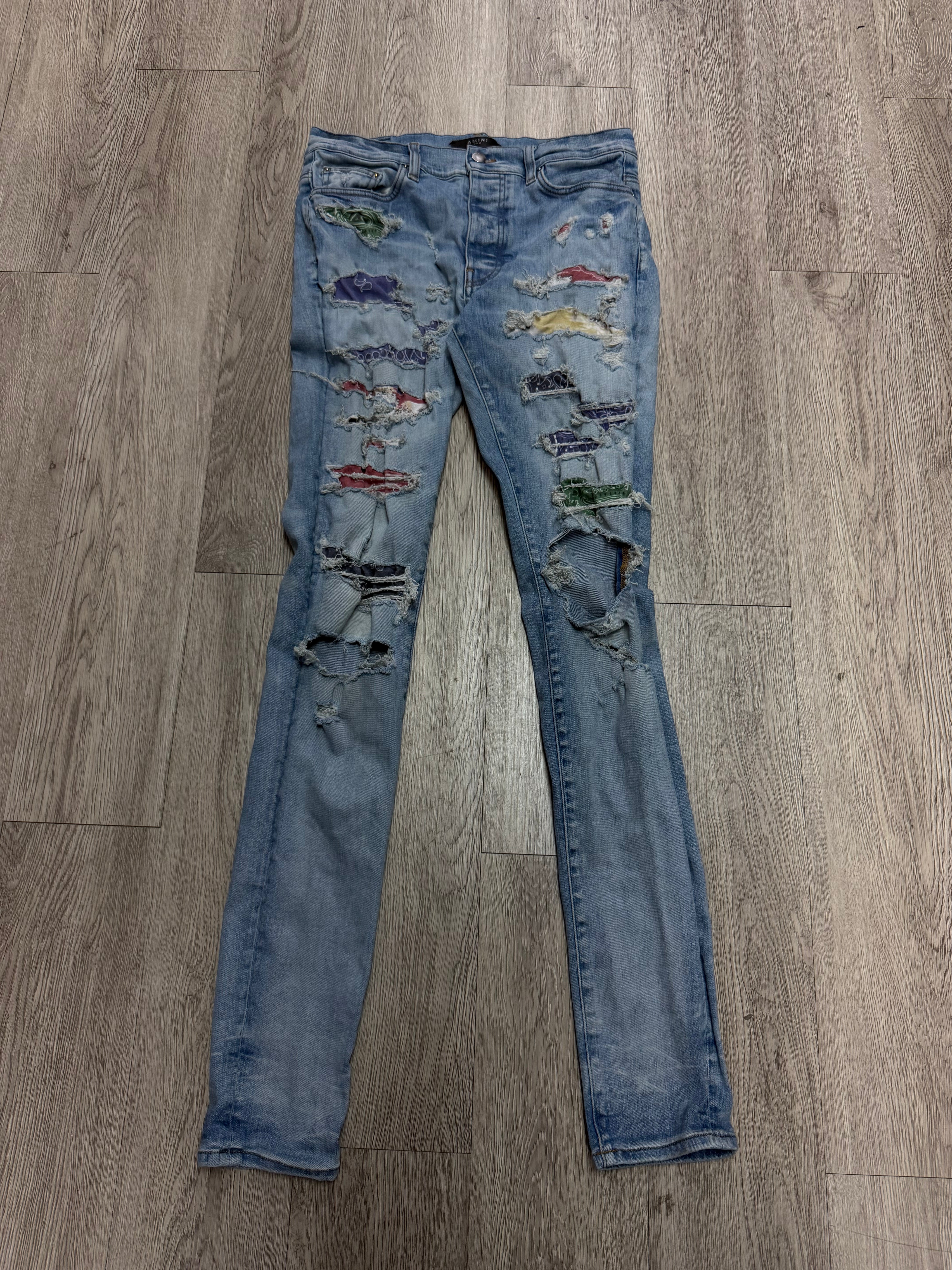 Amiri Light Wash Multi Color Thrasher Jeans
