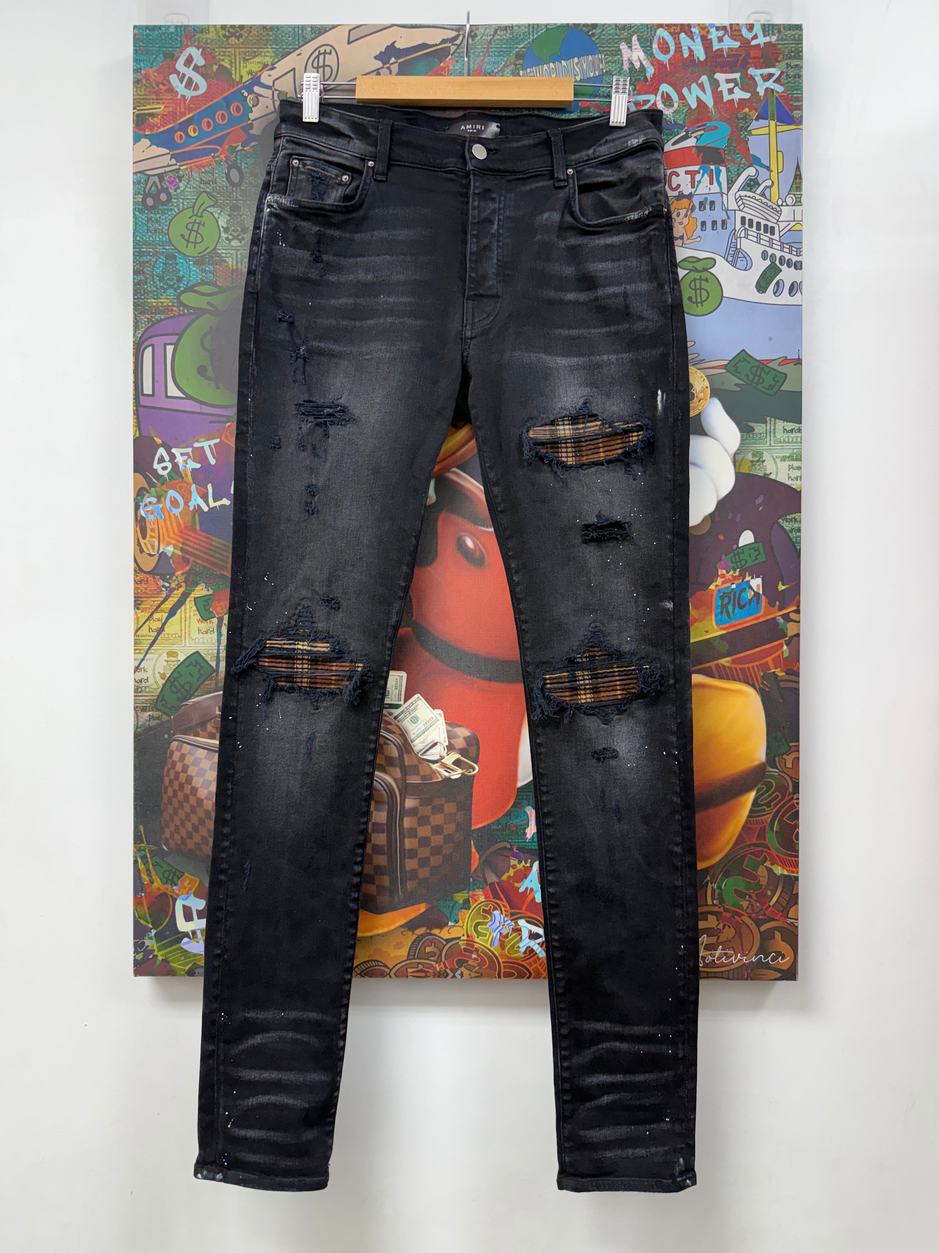 Amiri MX1 Black Wash Brown Plaid Patch Jeans