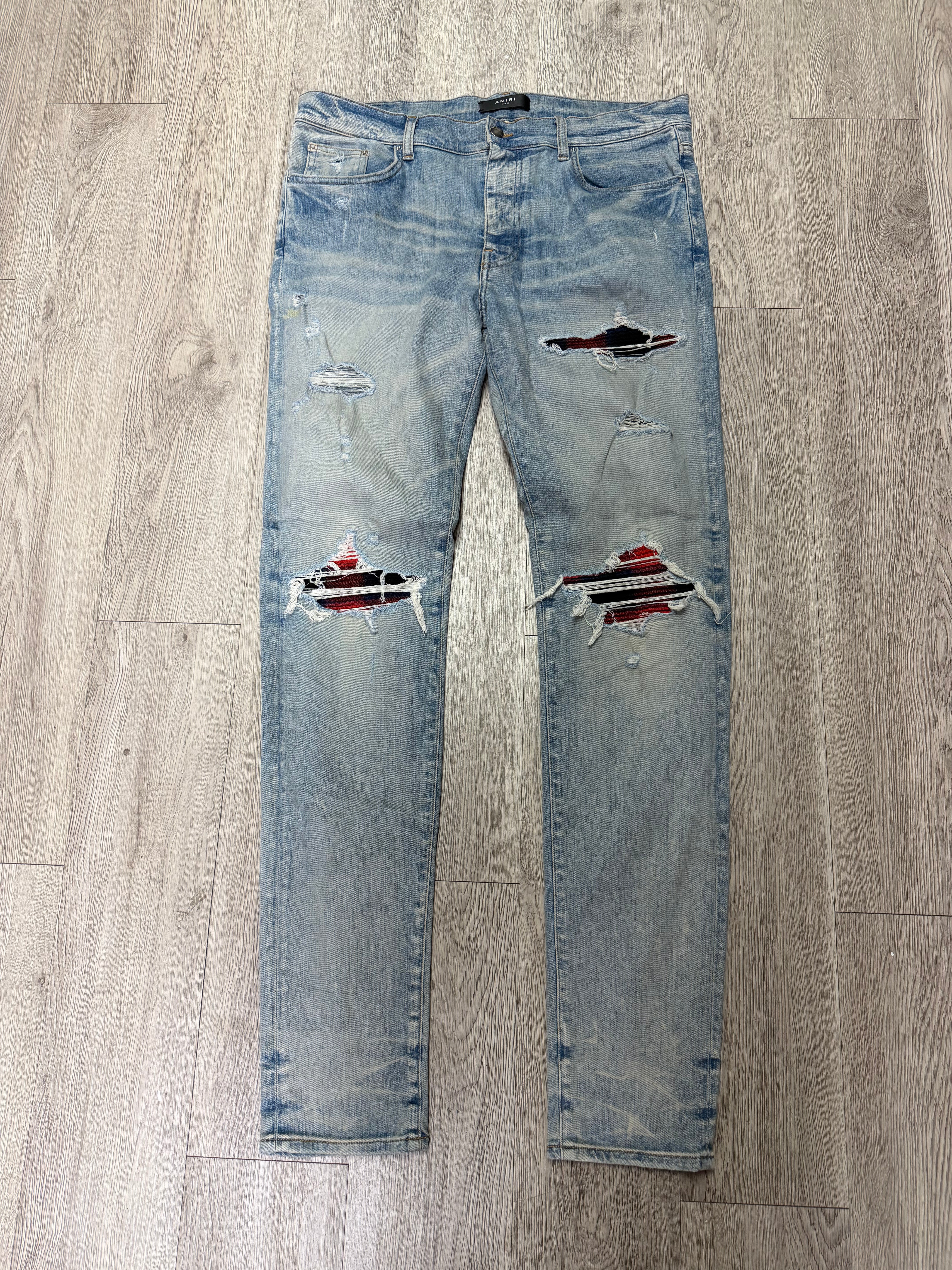 Amiri MX1 Light Wash Navy Red Patch Jeans