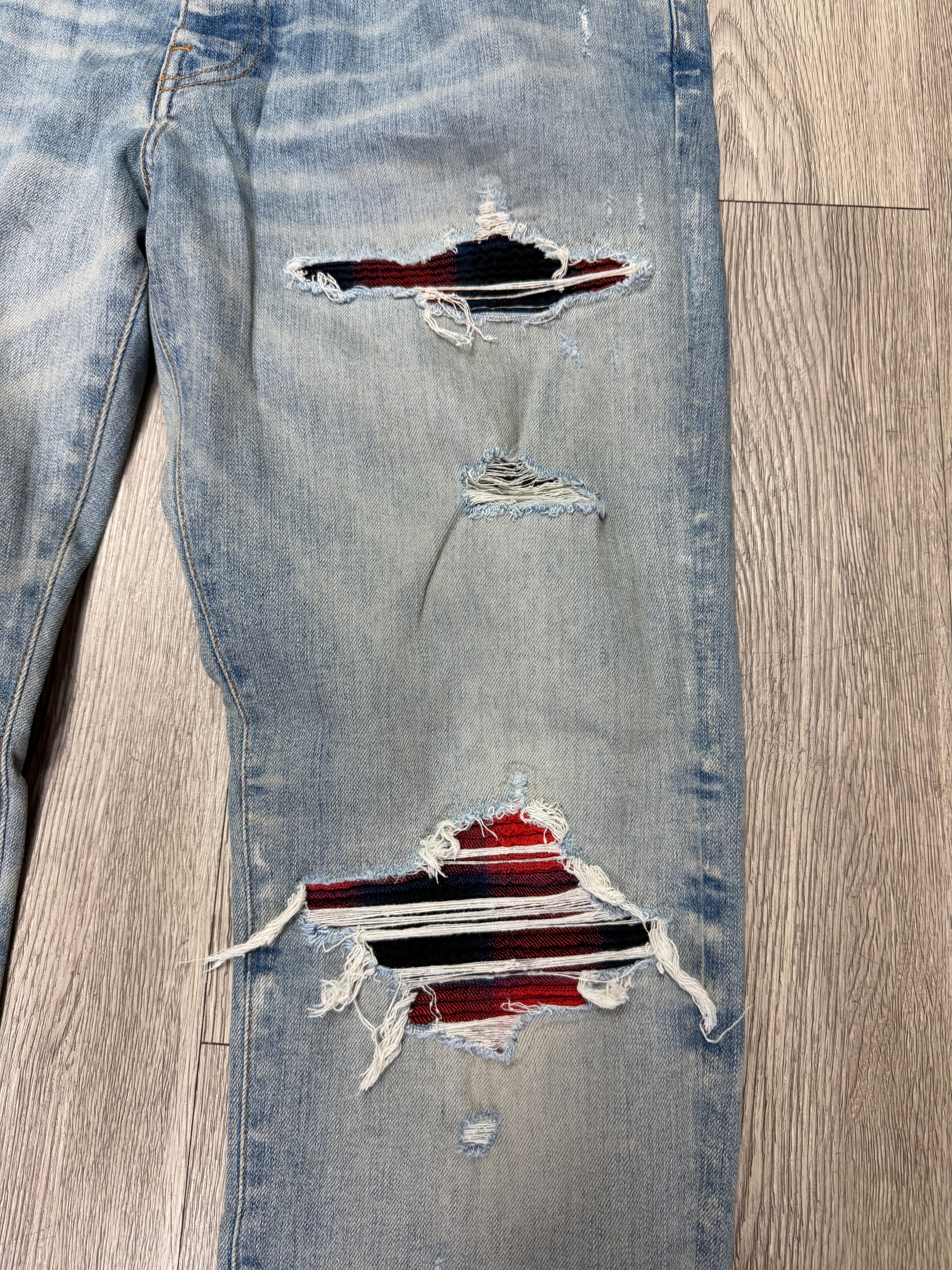 Amiri MX1 Light Wash Navy Red Patch Jeans