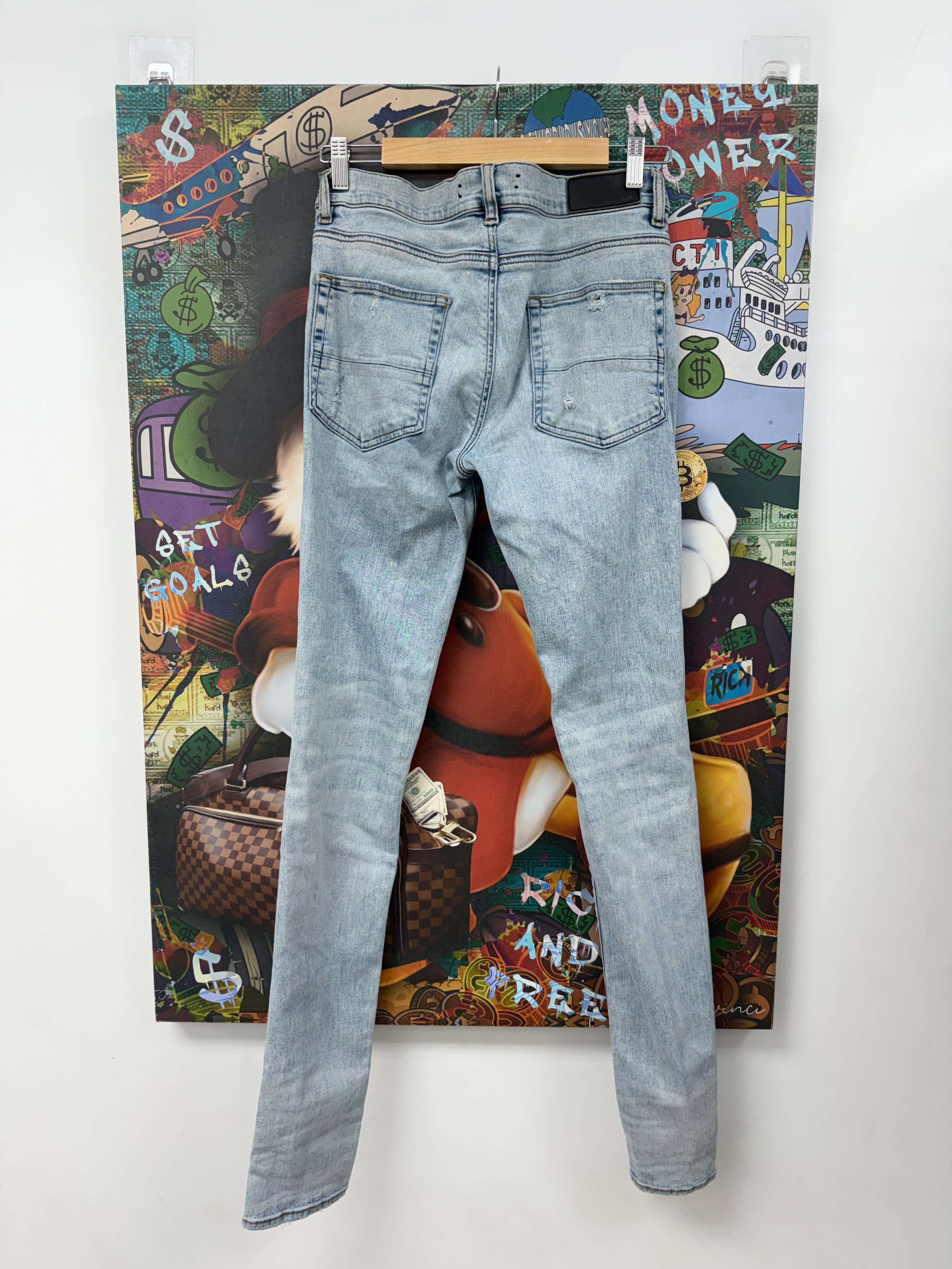 Amiri MX1 Light Wash Iridescent Patch Jeans