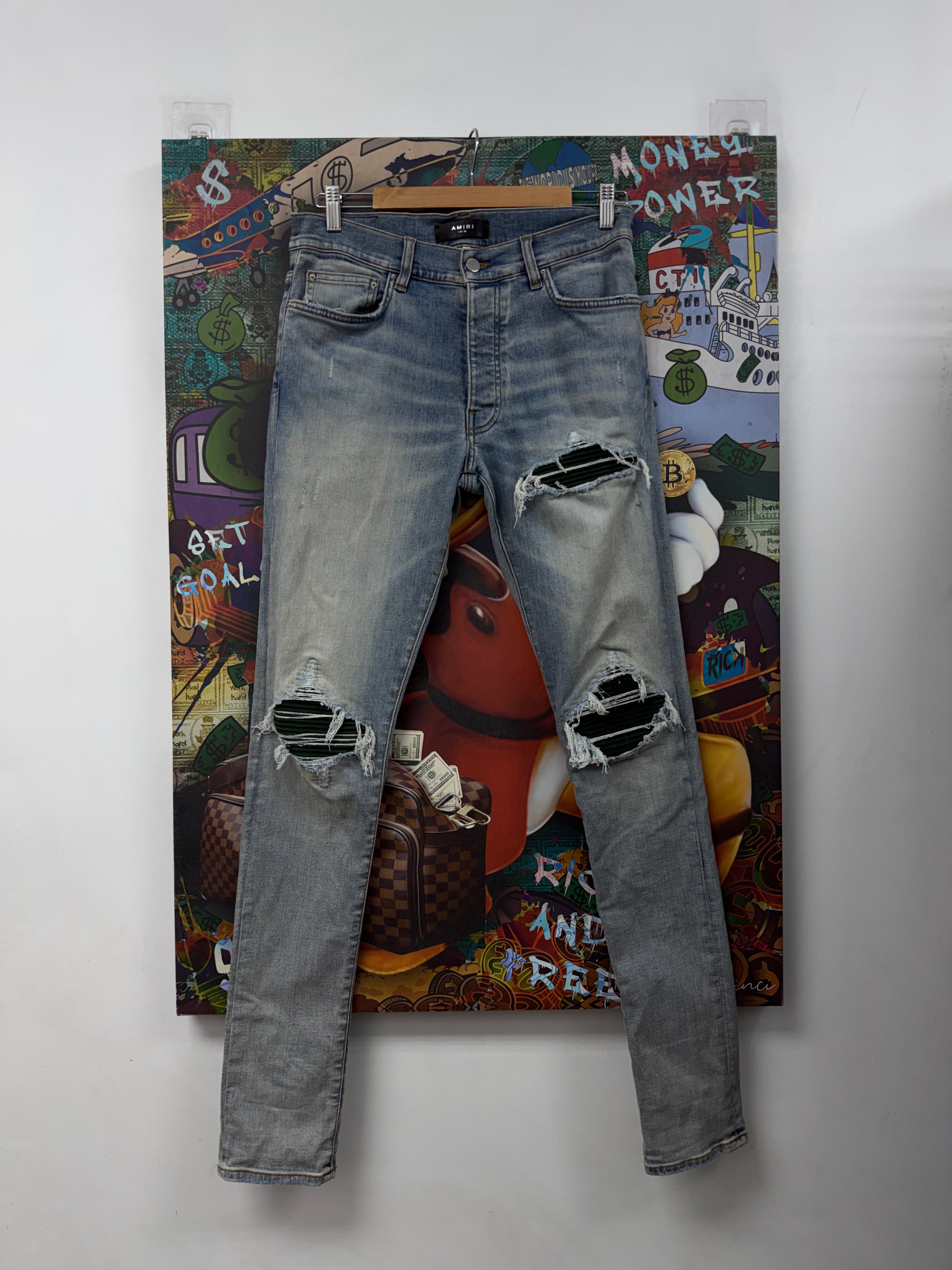 Amiri MX1 Light Wash Green Suede Patch Jeans