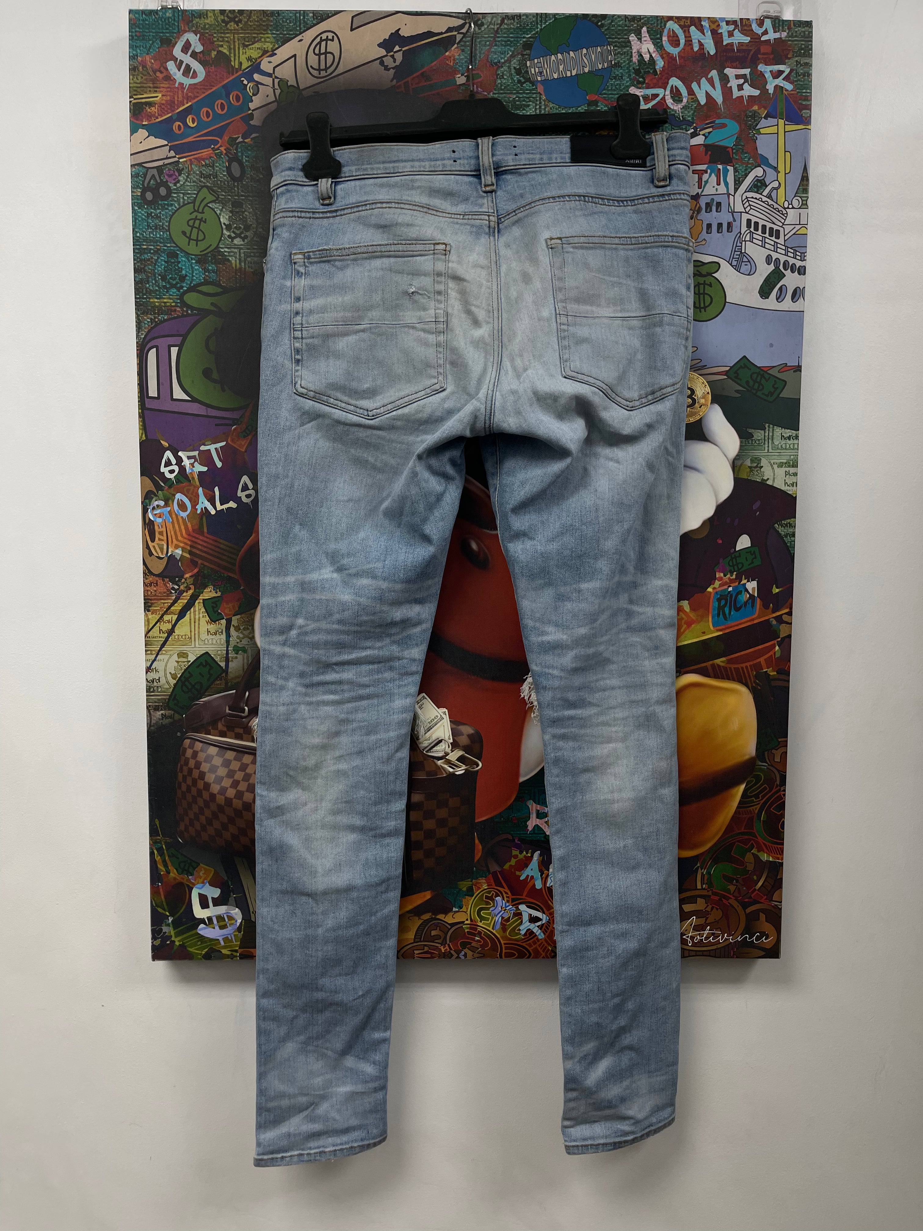 Amiri MX1 Light Wash White Leather Patch Jeans