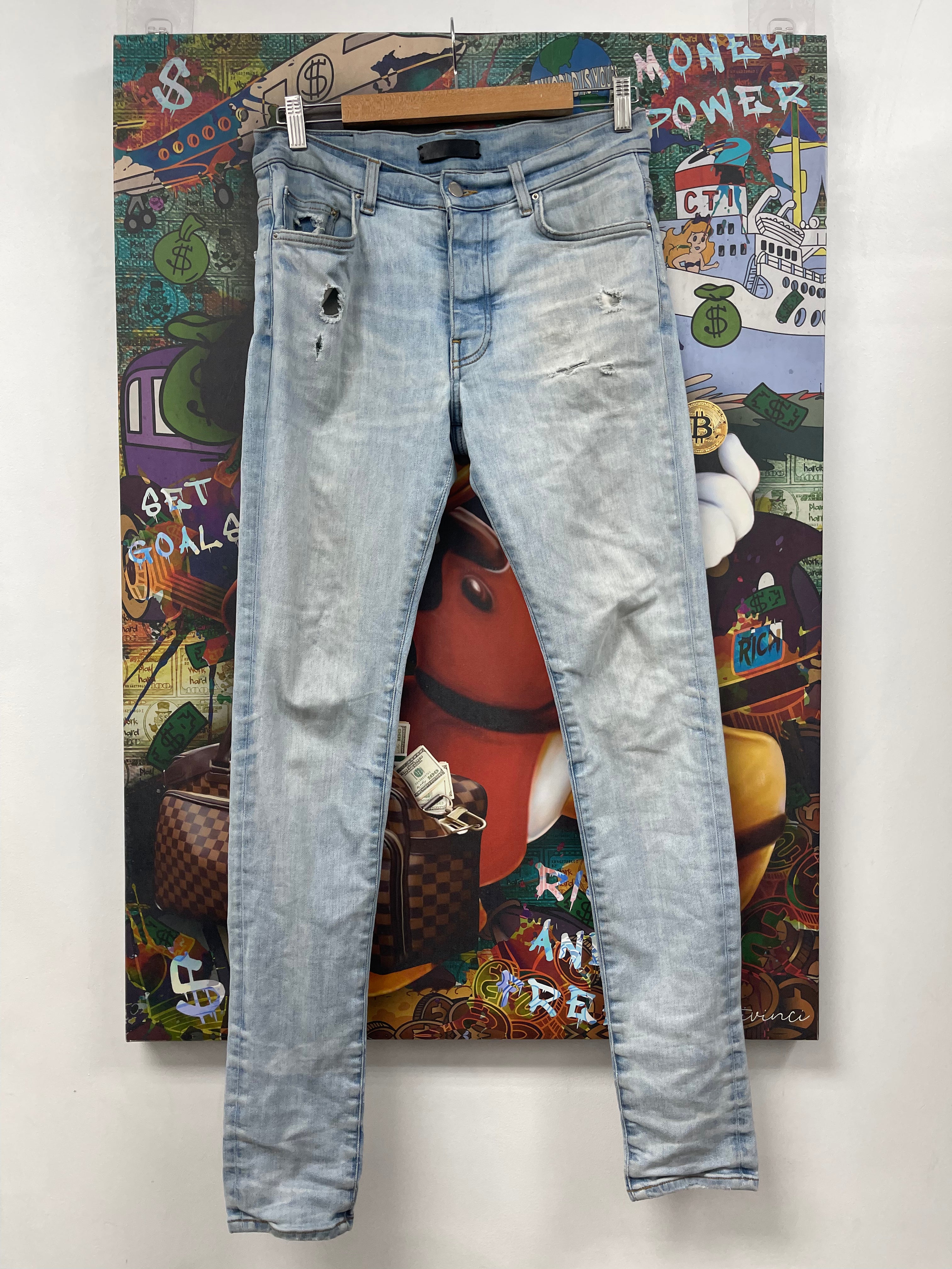 Amiri Light Wash Plain Ripped Jeans