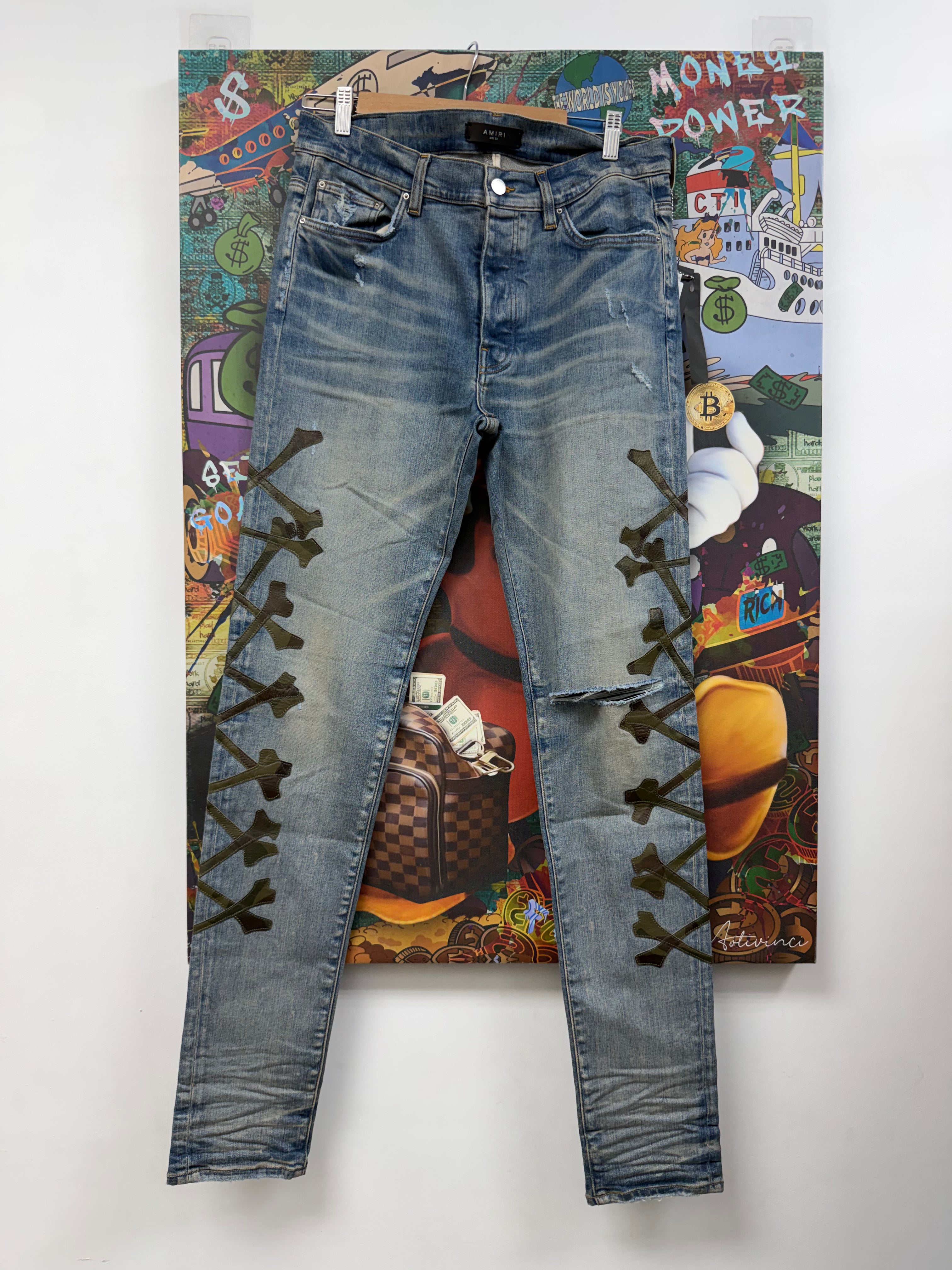 Amiri Light Wash Camo Bones Jeans