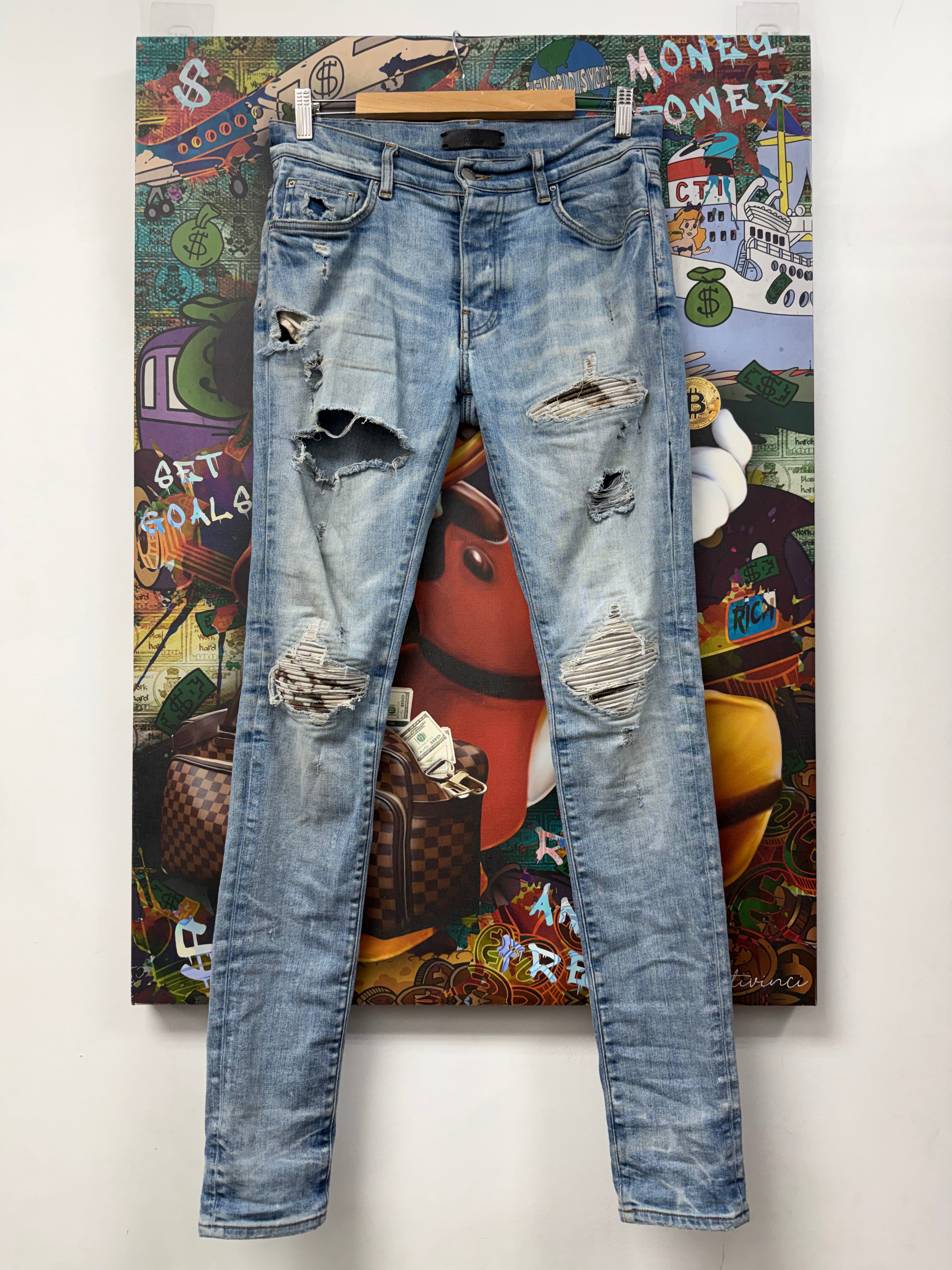 Amiri MX1 Light Wash Marble Patch Jeans