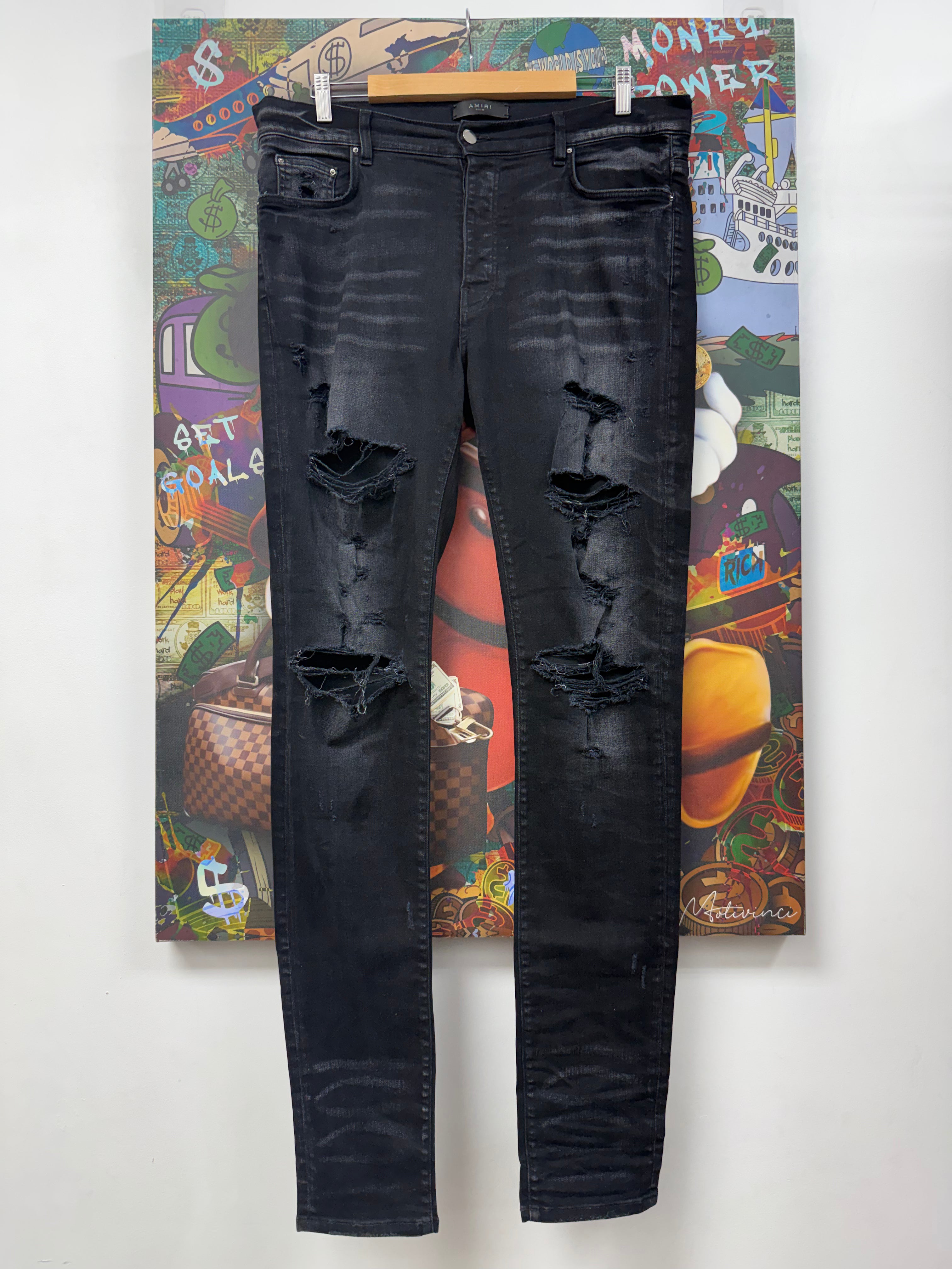 Amiri Black Wash Ripped Thrasher Jeans
