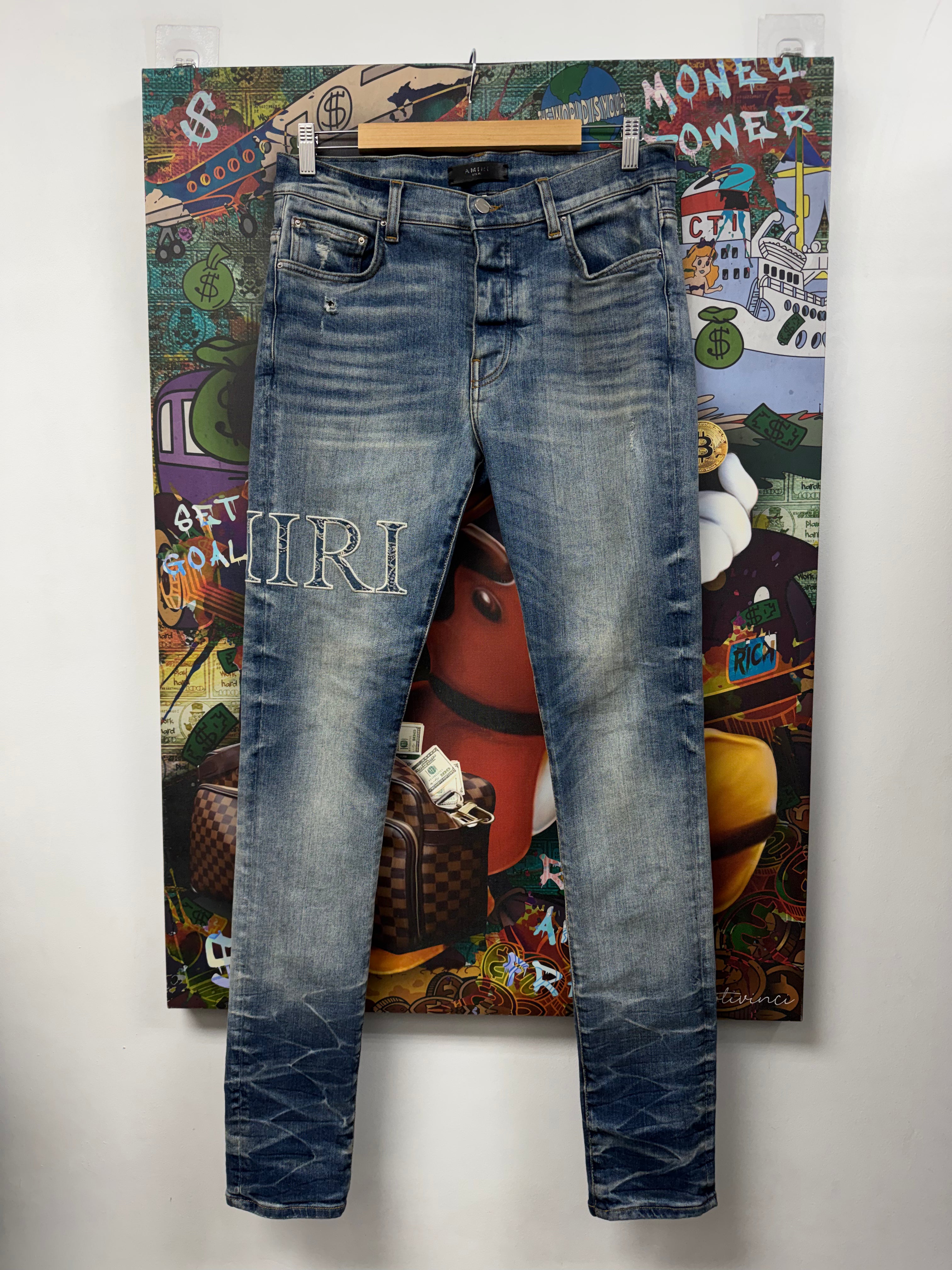 Amiri Light Wash Denim Side Logo Jeans