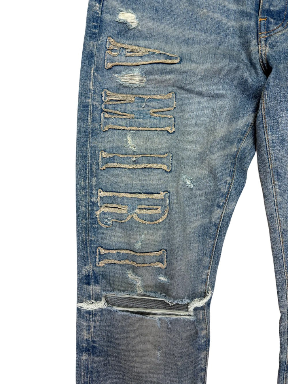 Amiri Side Logo Dirty Denim Appliqué Indigo Wash Jeans