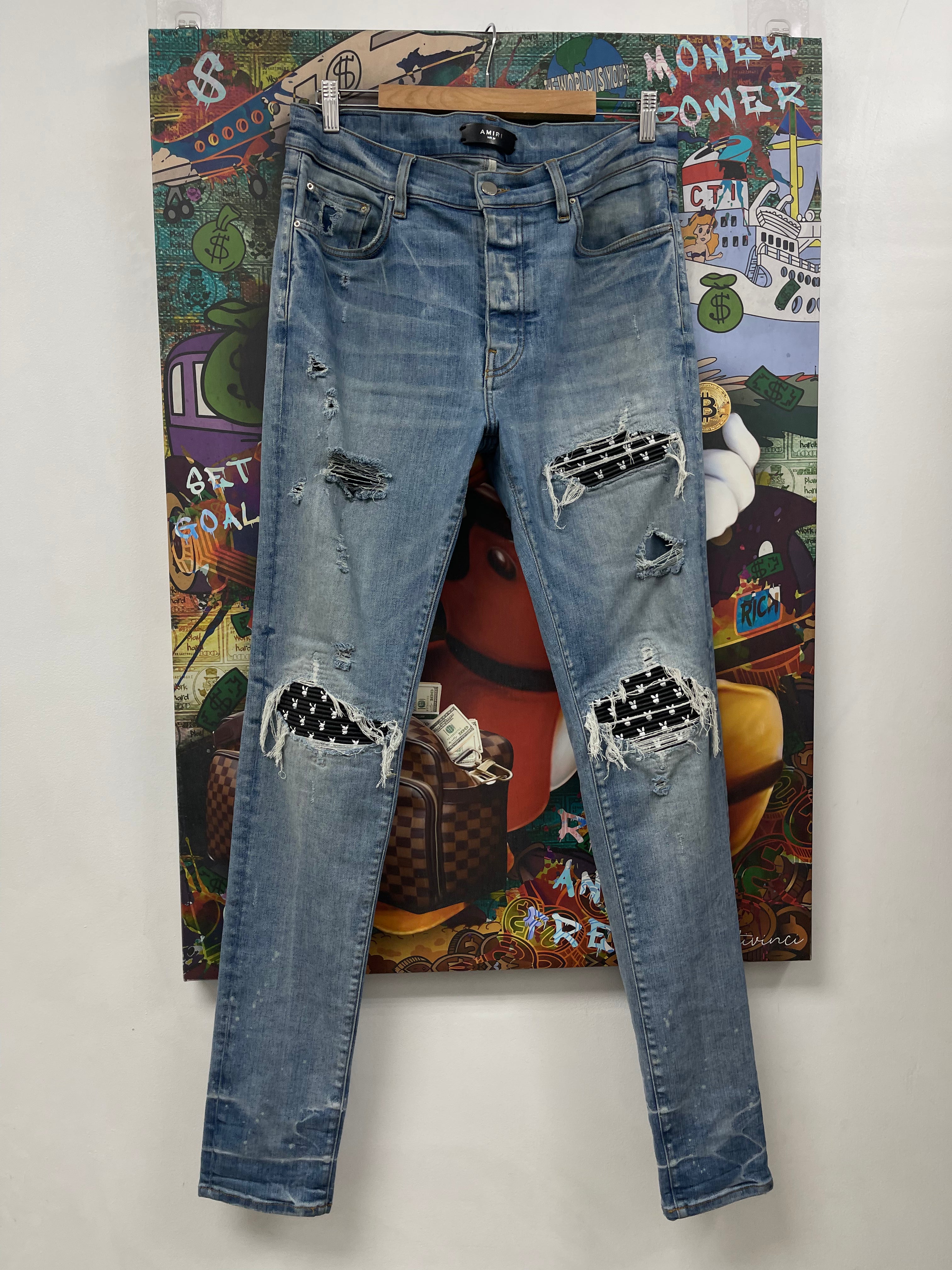 Amiri MX1 Light Wash Black Playboy Patch Jeans (Repaired Crotch)