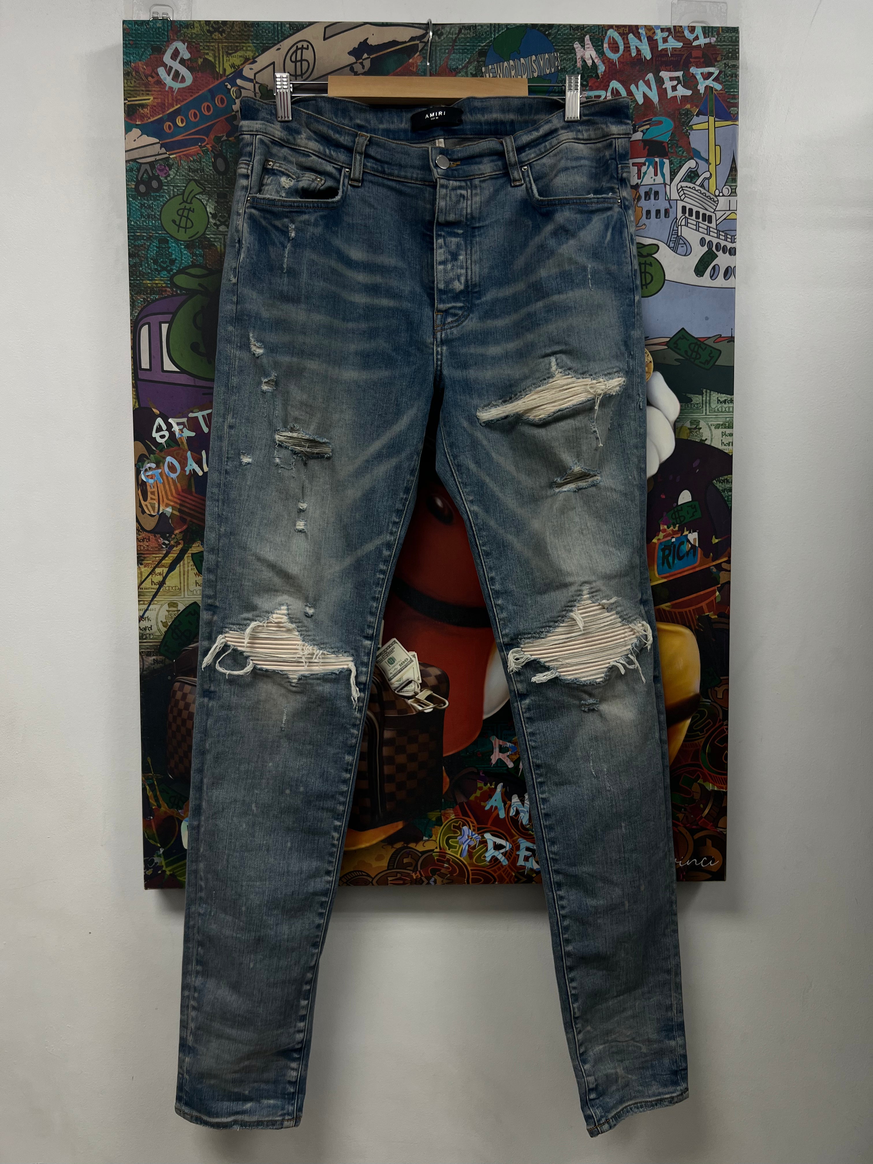Amiri MX1 LiGht Wash White Patch Jeans