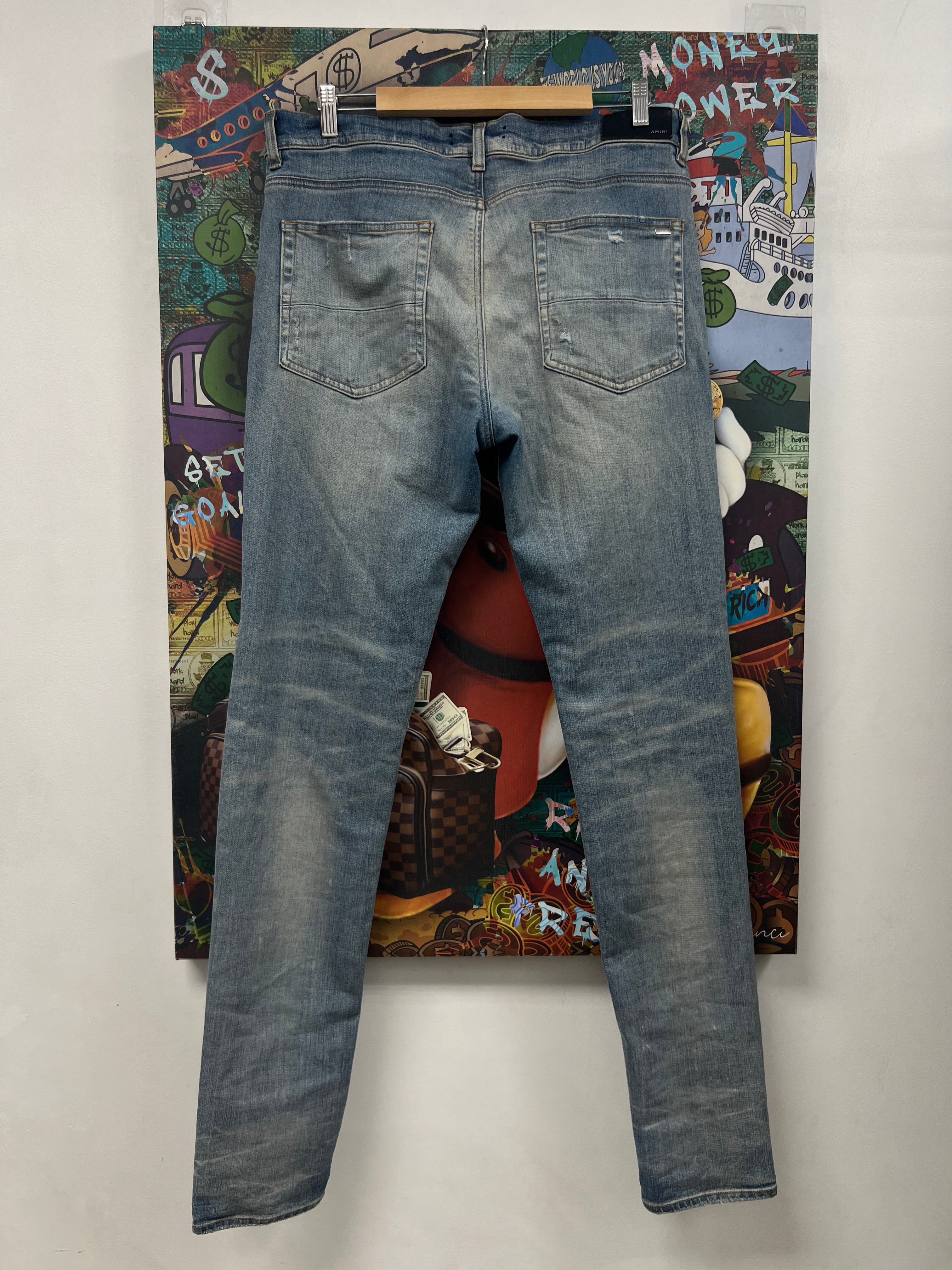 Amiri MX1 LiGht Wash White Patch Jeans