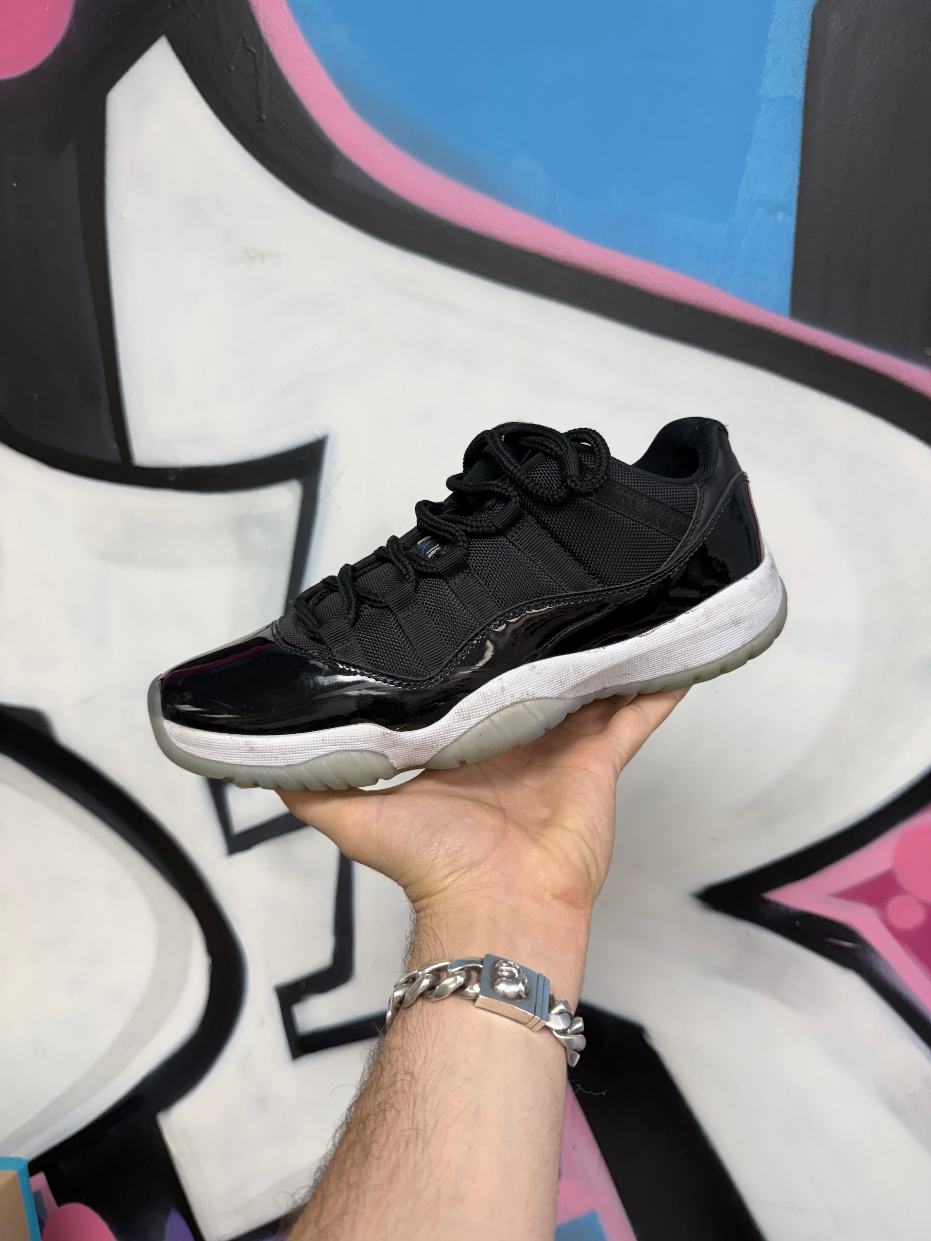 Jordan 11 Low Space Jam Sneakers