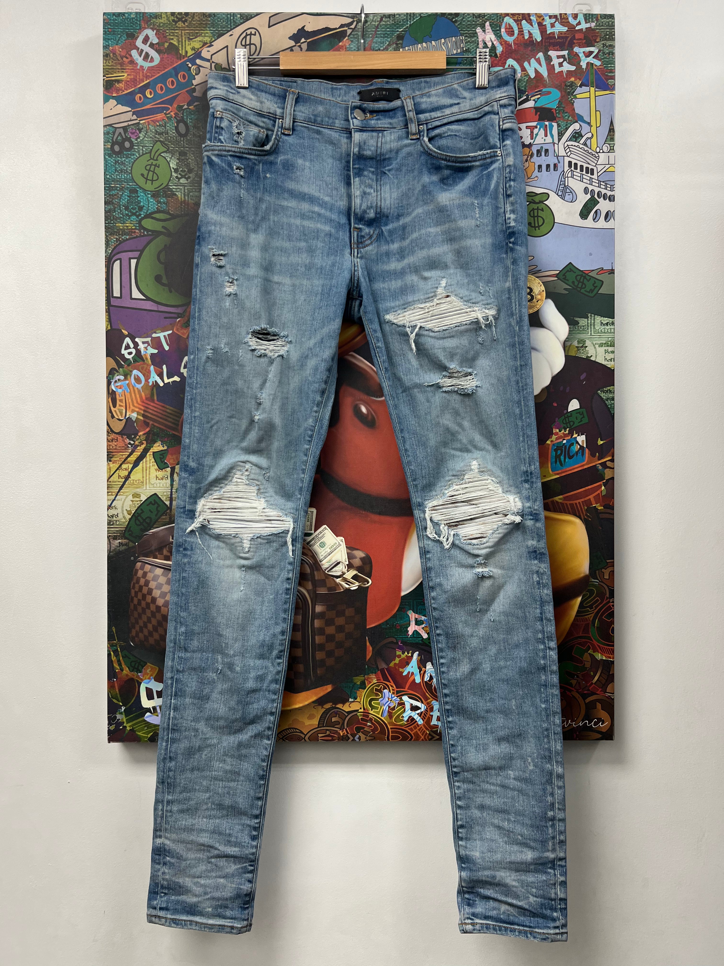 Amiri MX1 Light Wash Marble Patch Jeans