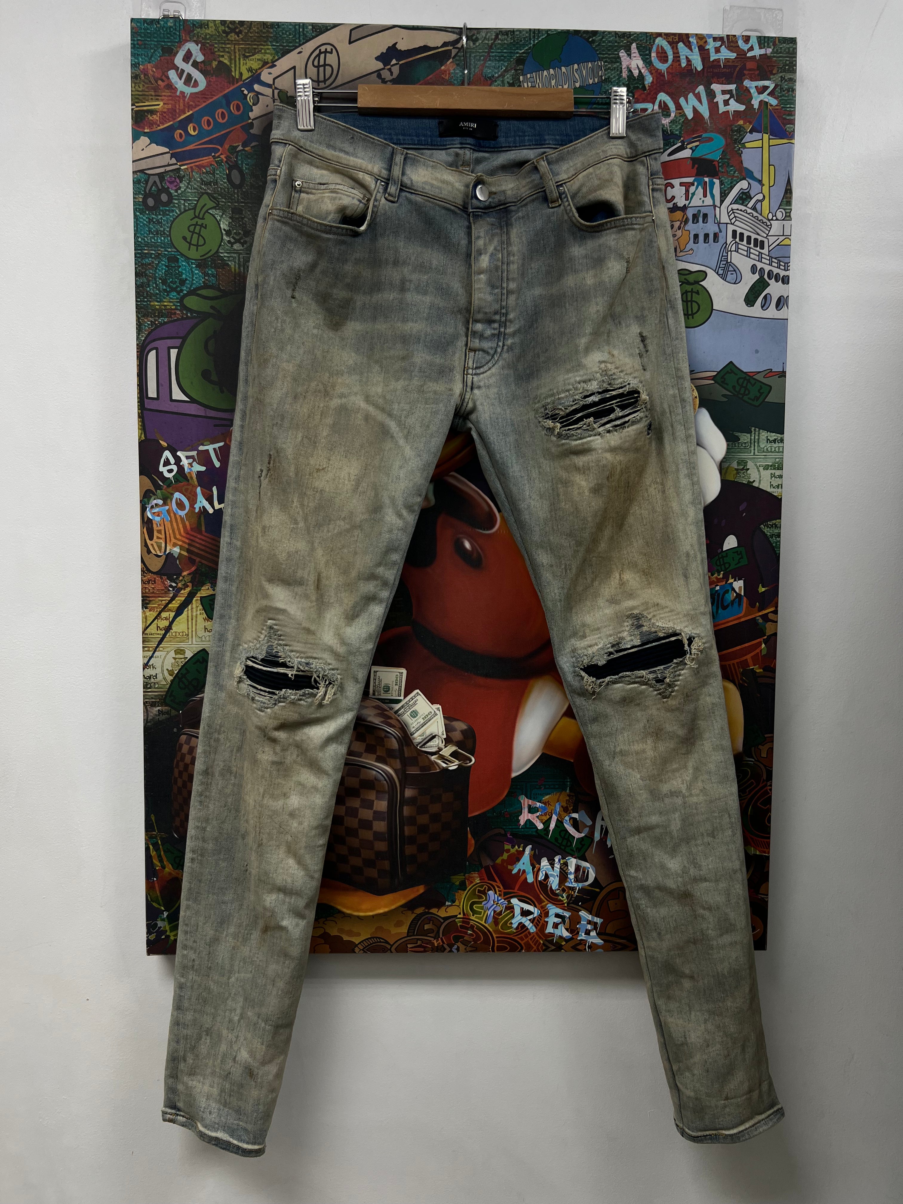 Amiri MX1 Dirty Wash Black Patch Jeans