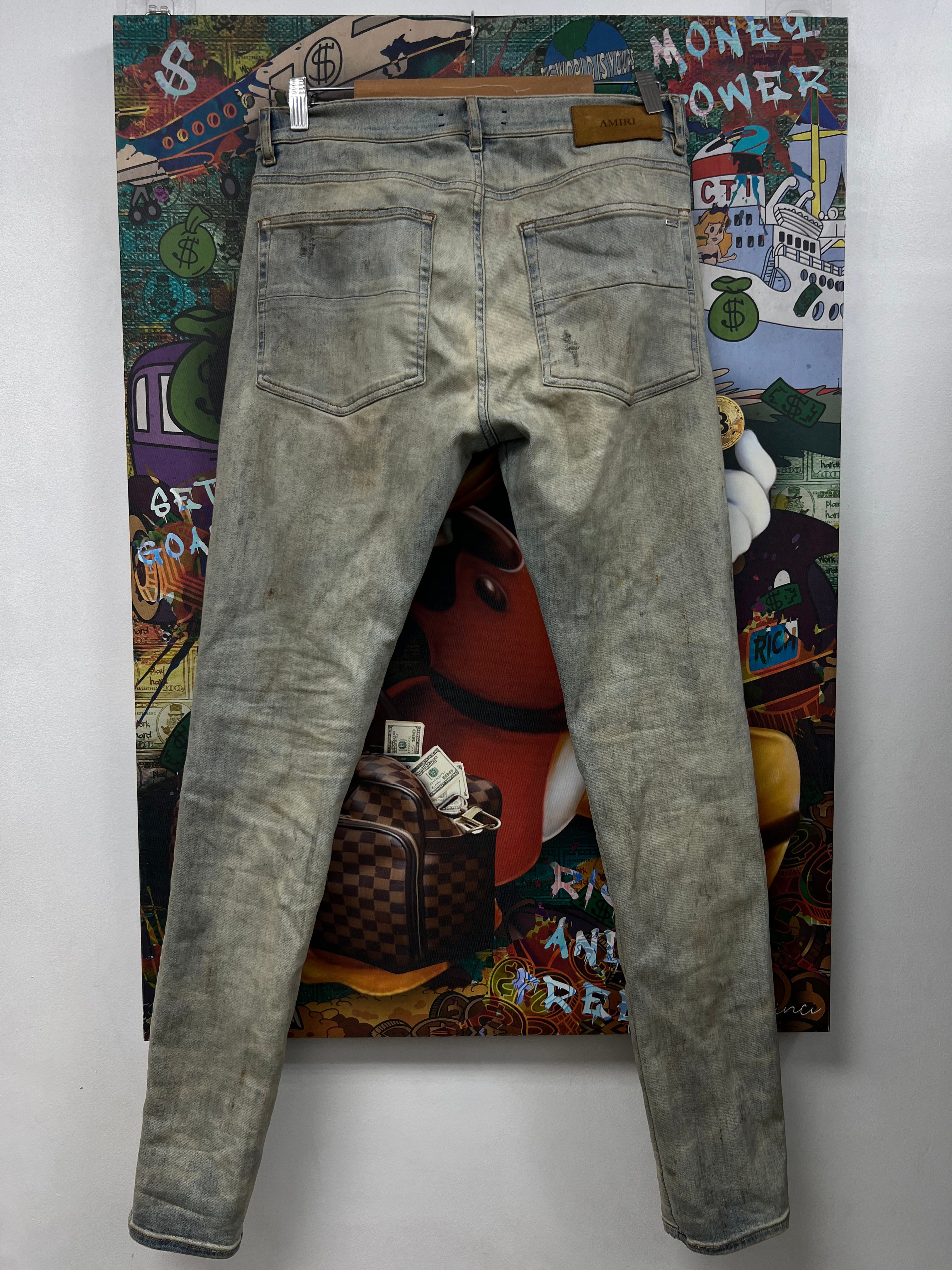 Amiri MX1 Dirty Wash Black Patch Jeans