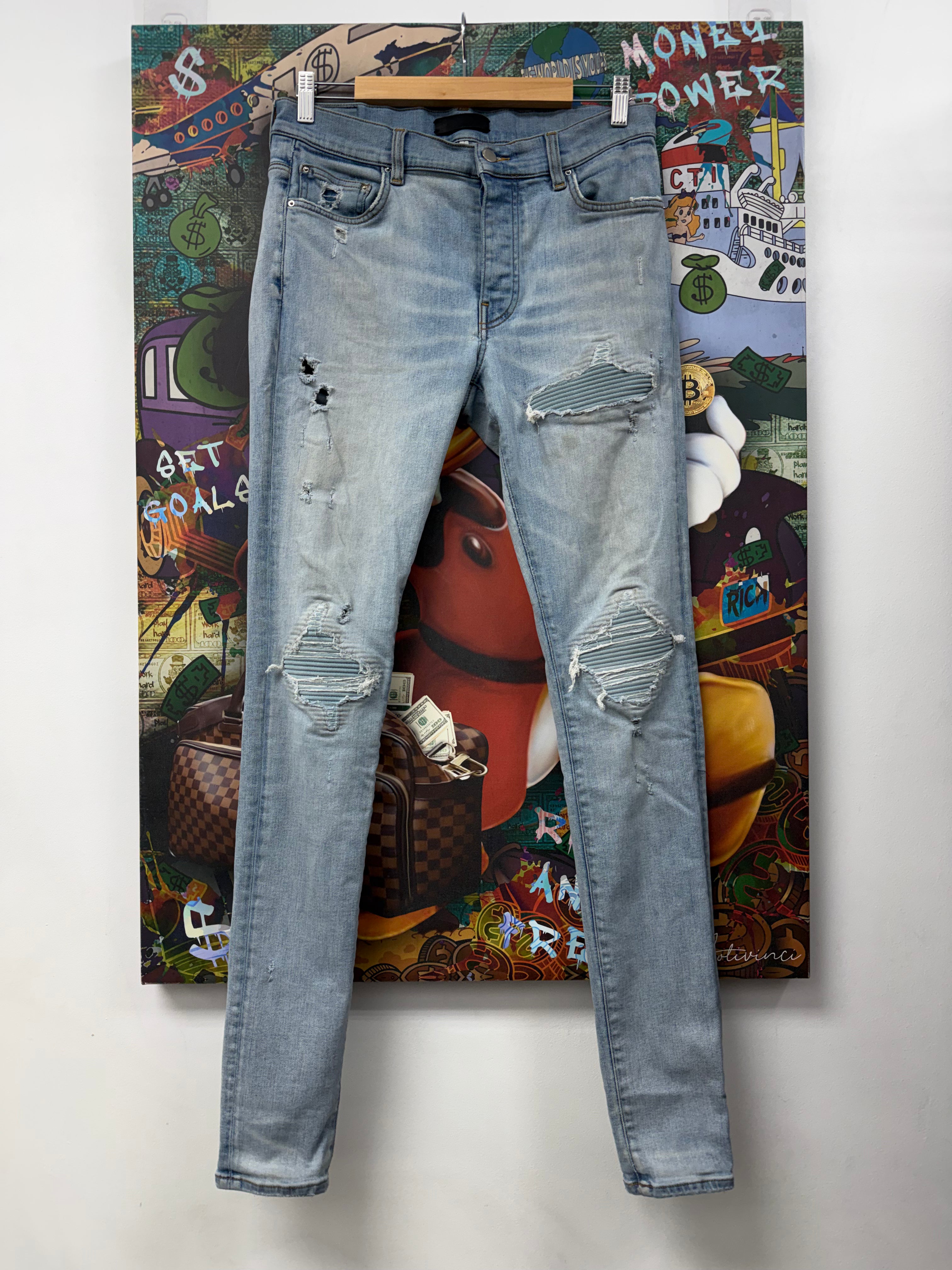 Amiri MX1 Light Wash Baby Blue Ultra Suede Patch Jeans