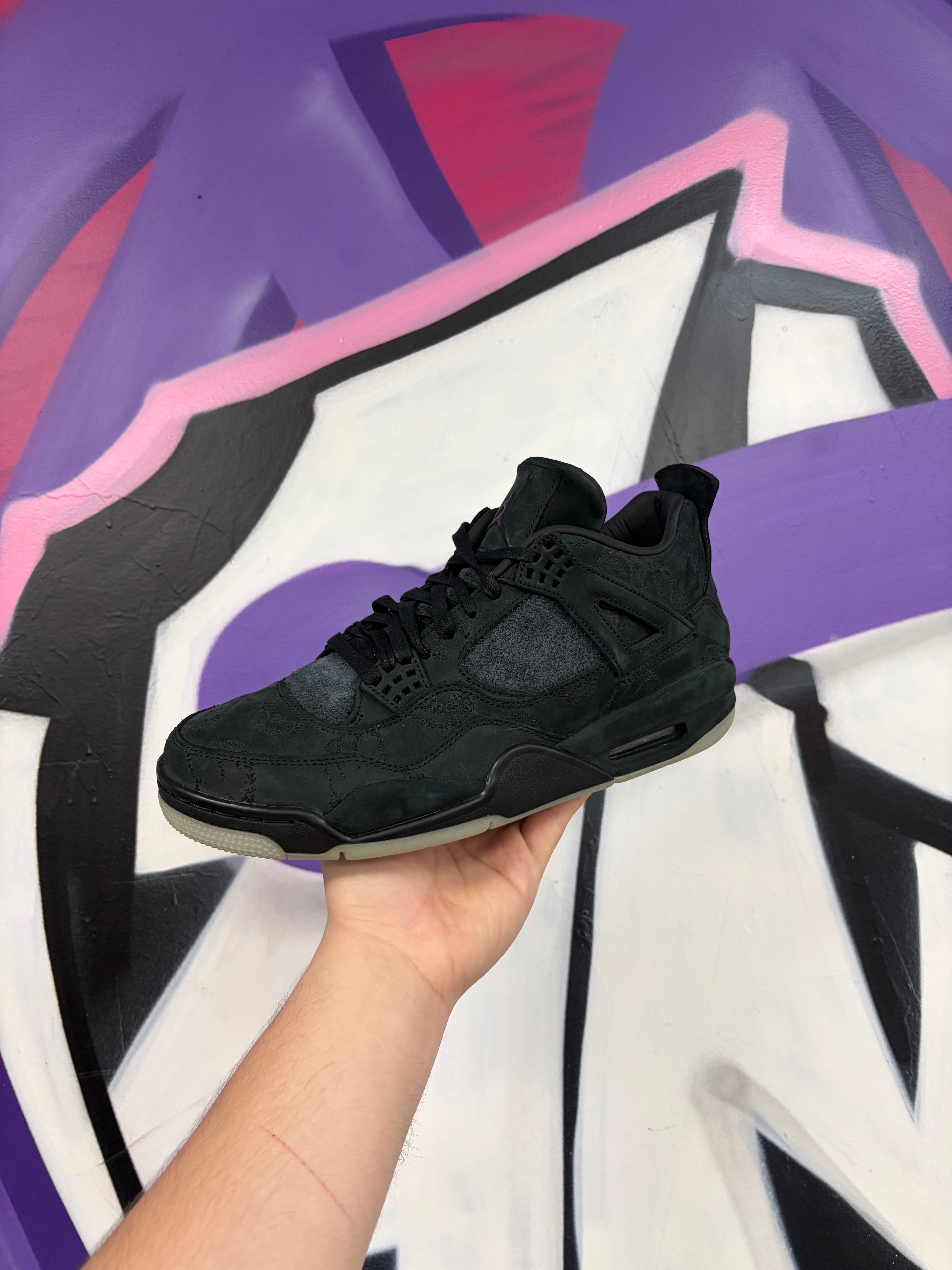 Jordan 4 Kaws Black Sneakers