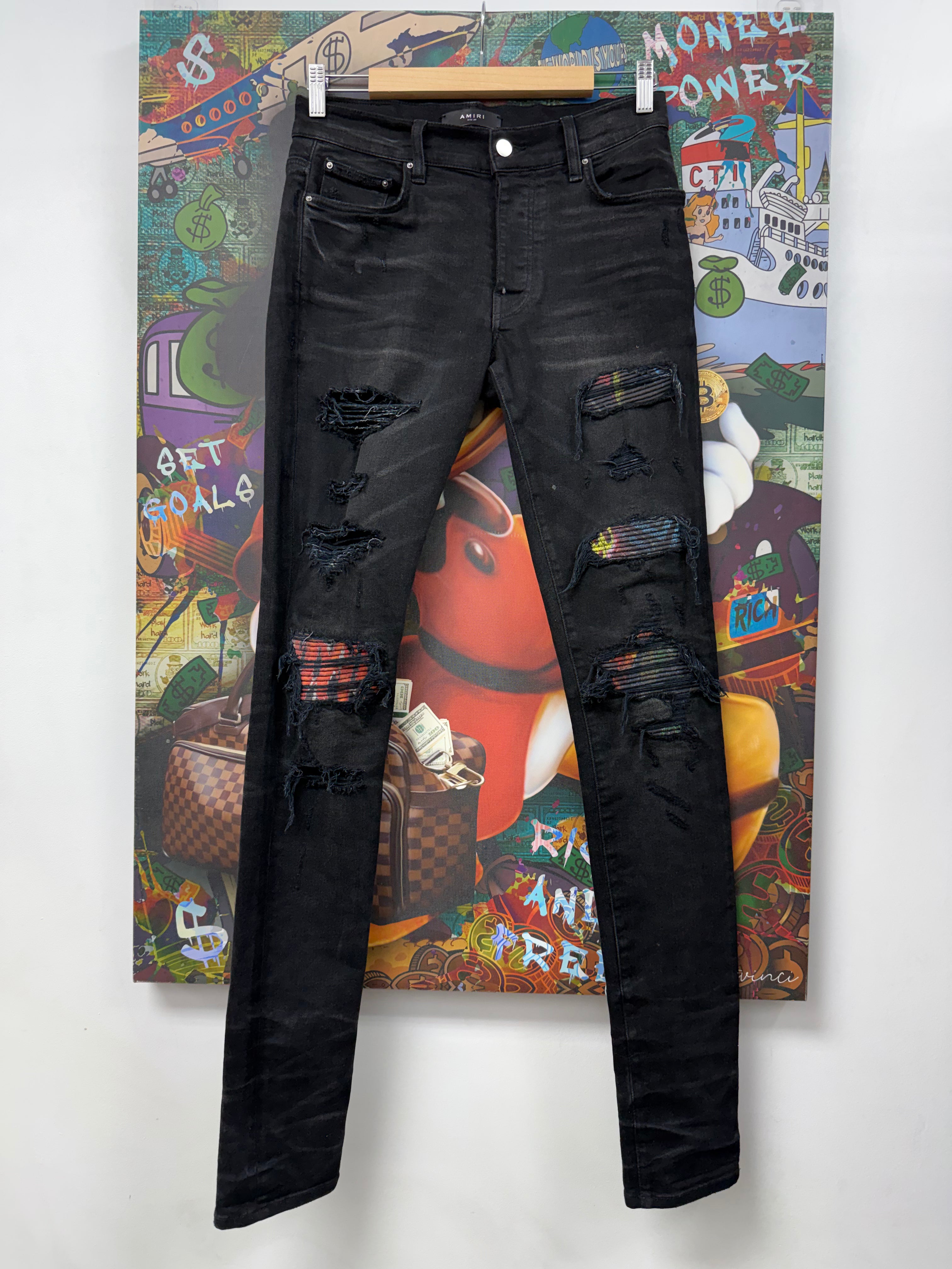 Amiri Black Wash Animation Thrasher Patch Jeans