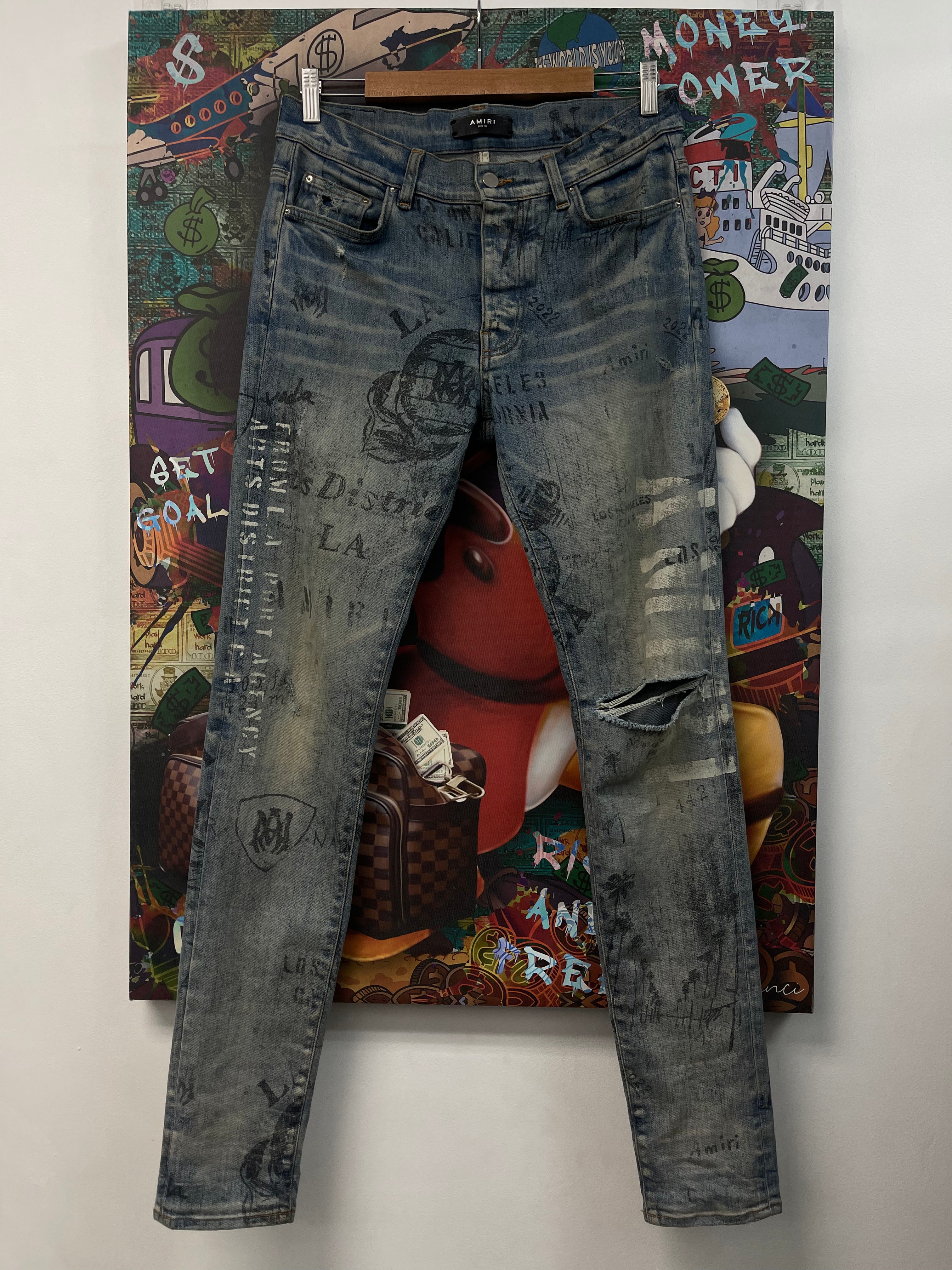 Amiri Light Wash Stencil Jeans